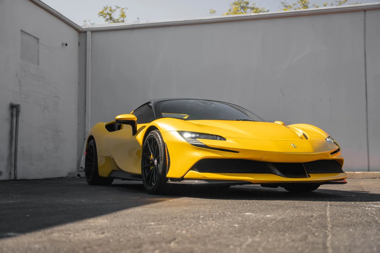 Ferrari SF90 after Paint Protection Film (PPF), Window Tint and Ceramic Coating, front-left three-quarter view