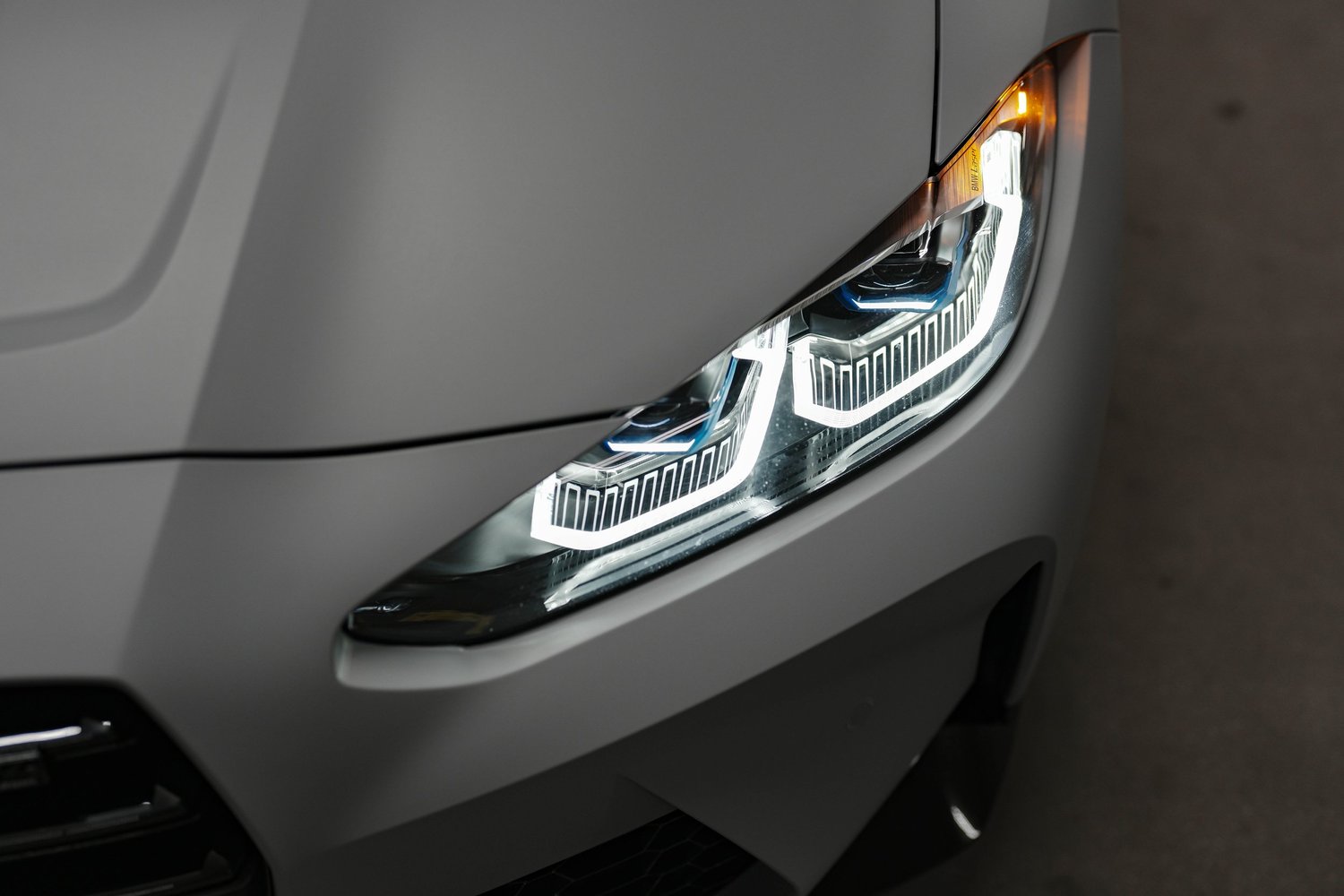 Brooklyn Grey BMW M4 after Matte PPF, Window Tint and Ceramic Coating, front bumper and headlight detail