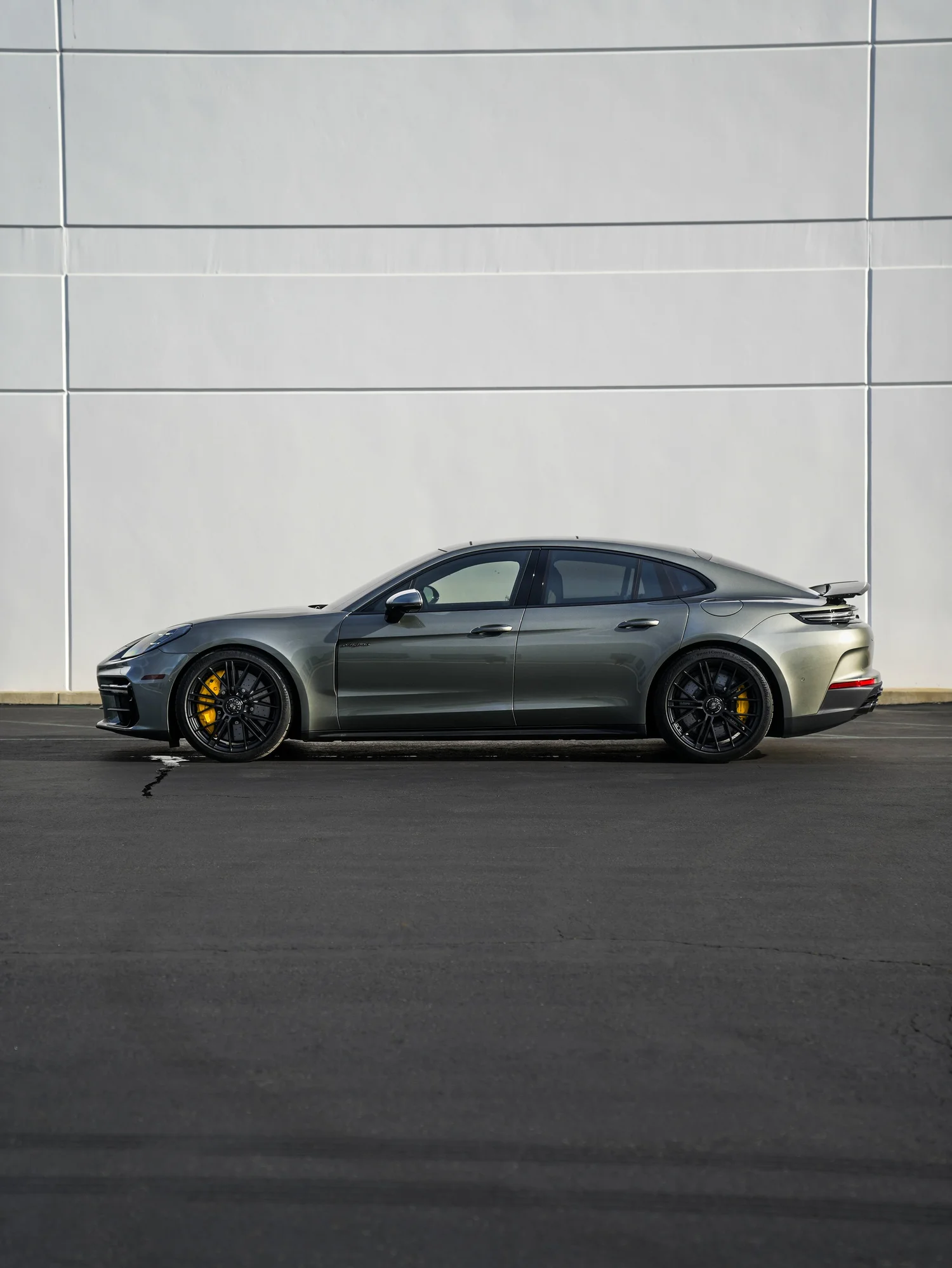 Porsche Panamera Turbo S after Paint Protection Film (PPF), Window Tint and Ceramic Coating, rear-left three-quarter view