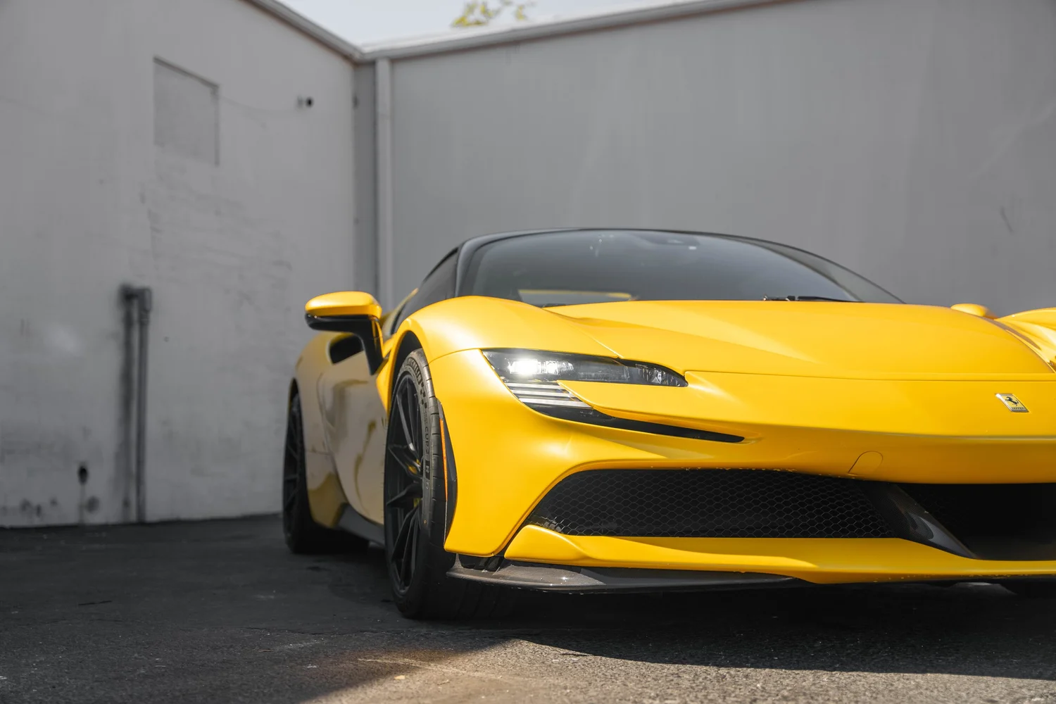 Ferrari SF90 after Paint Protection Film (PPF), Window Tint and Ceramic Coating, front wheel and body view