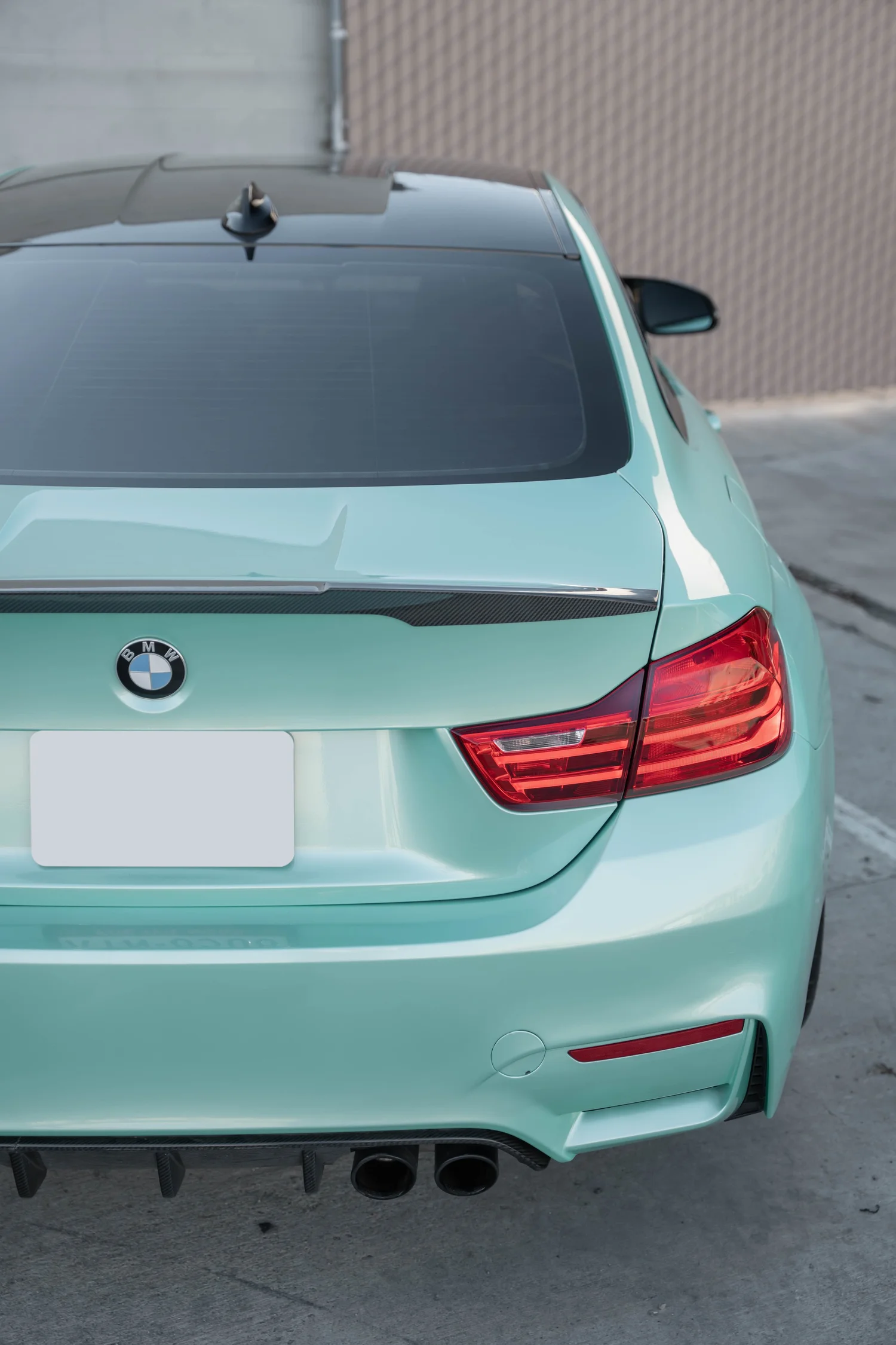 BMW M4 Mint Green after Vinyl Wrap, rear body and taillight view