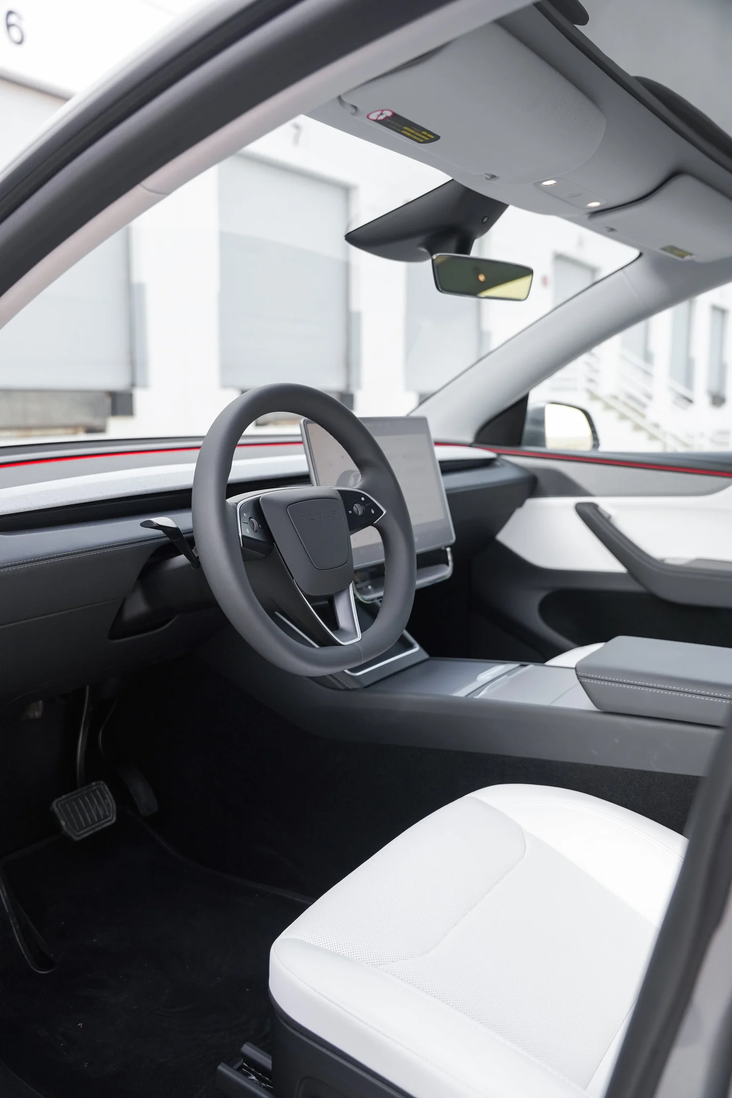 Grey Tesla Model Y after Paint Protection Film (PPF), Window Tint and Ceramic Coating, interior cabin detail