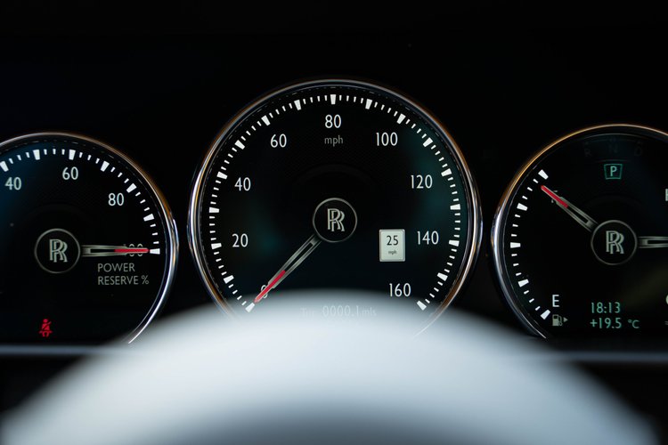 Close view of the instrument cluster with speedometer, power-reserve and fuel gauges.