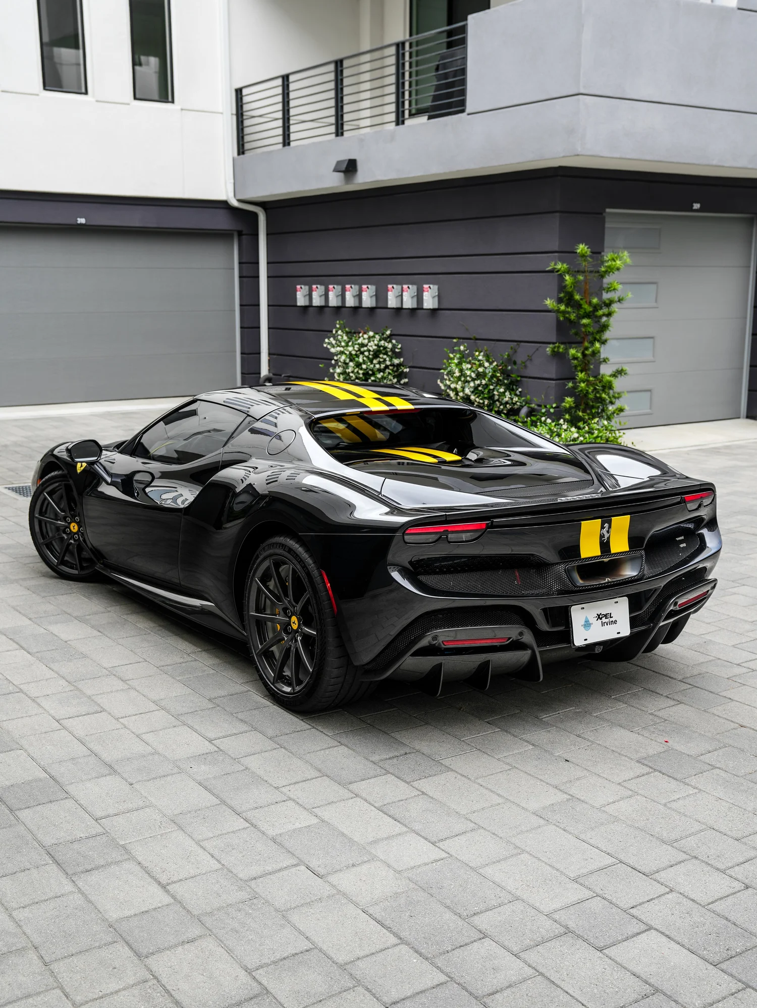 Ferrari 296 GTB PPF & Custom Decals after Paint Protection Film (PPF) and Custom Graphics, rear-left three-quarter view