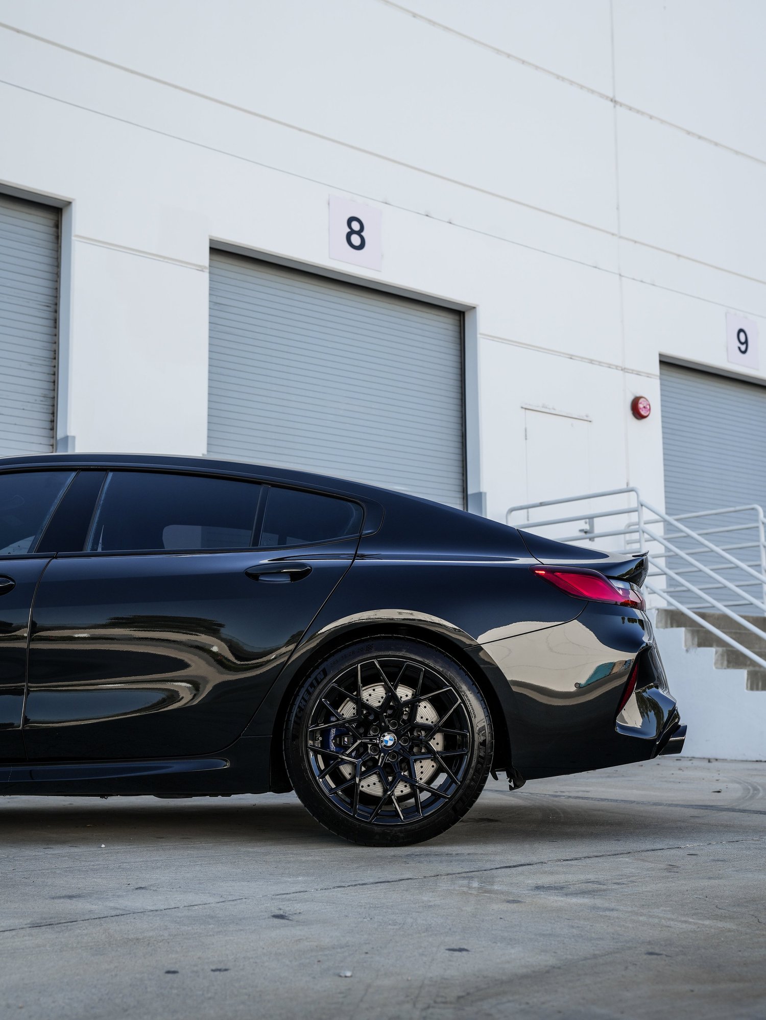 BMW M8 Paint Correction after Ceramic Coating, rear-quarter and wheel view