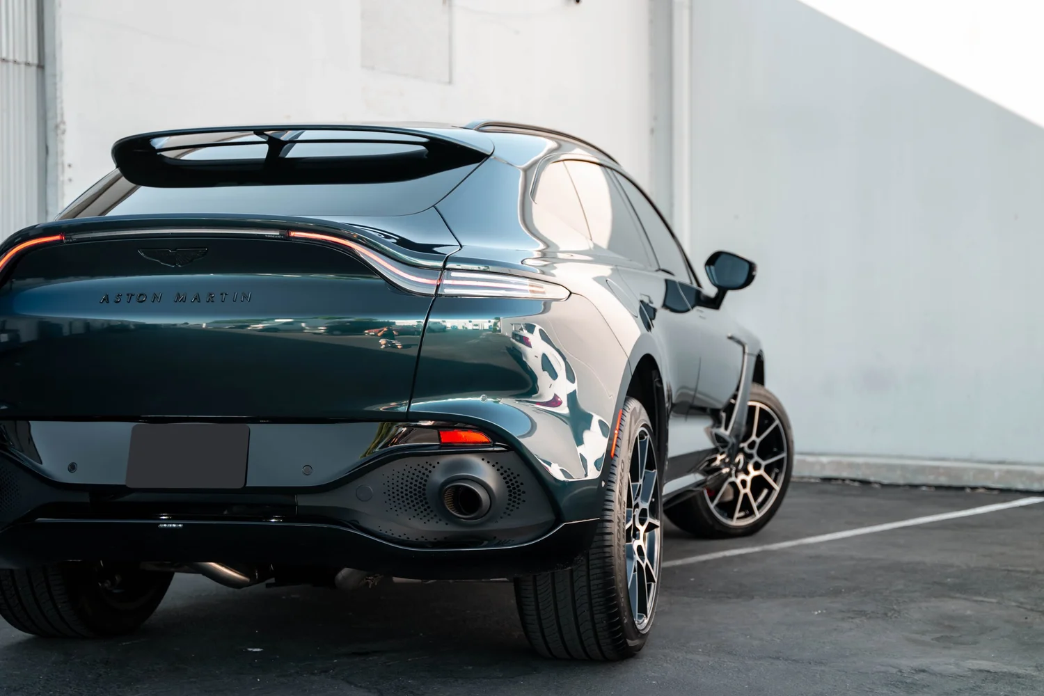 Aston Martin DBX after Paint Protection Film (PPF), Window Tint and Ceramic Coating, rear-quarter and wheel view