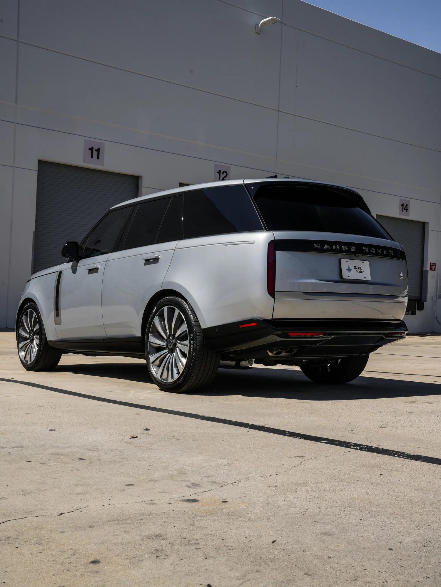 Range Rover SV rear three-quarter view from the driver side after full exterior PPF, window tint and ceramic coating