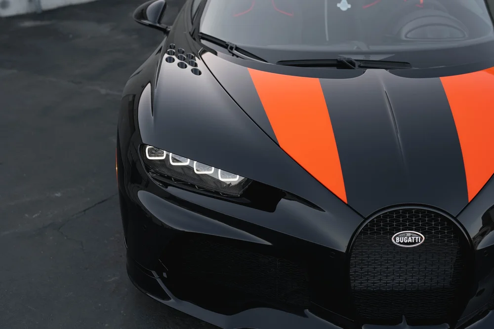 Bugatti Chiron Super Sport 300+ front bodywork and orange hood accents viewed from above