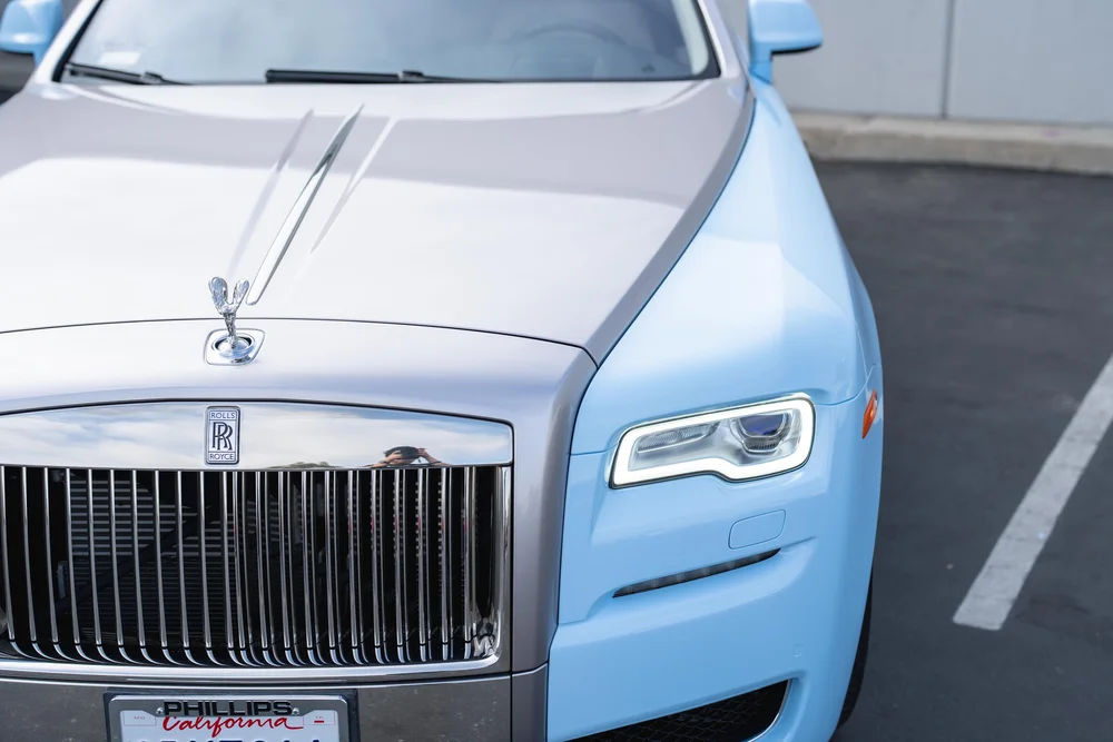 Rolls-Royce Ghost — elevated front detail of the hood, grille and headlamp area