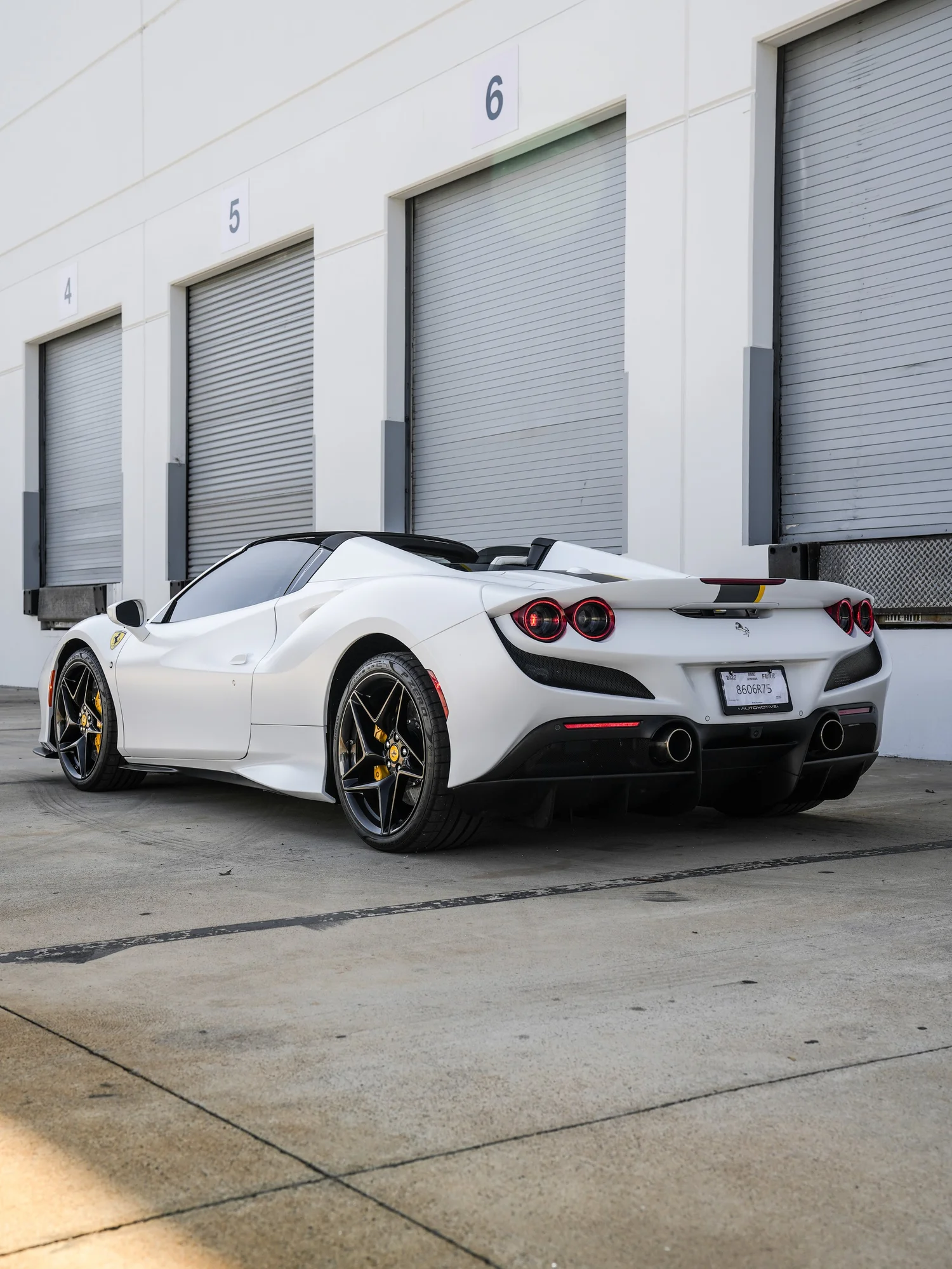 Ferrari F8 Spider after Matte PPF and Window Tint, rear-left three-quarter view