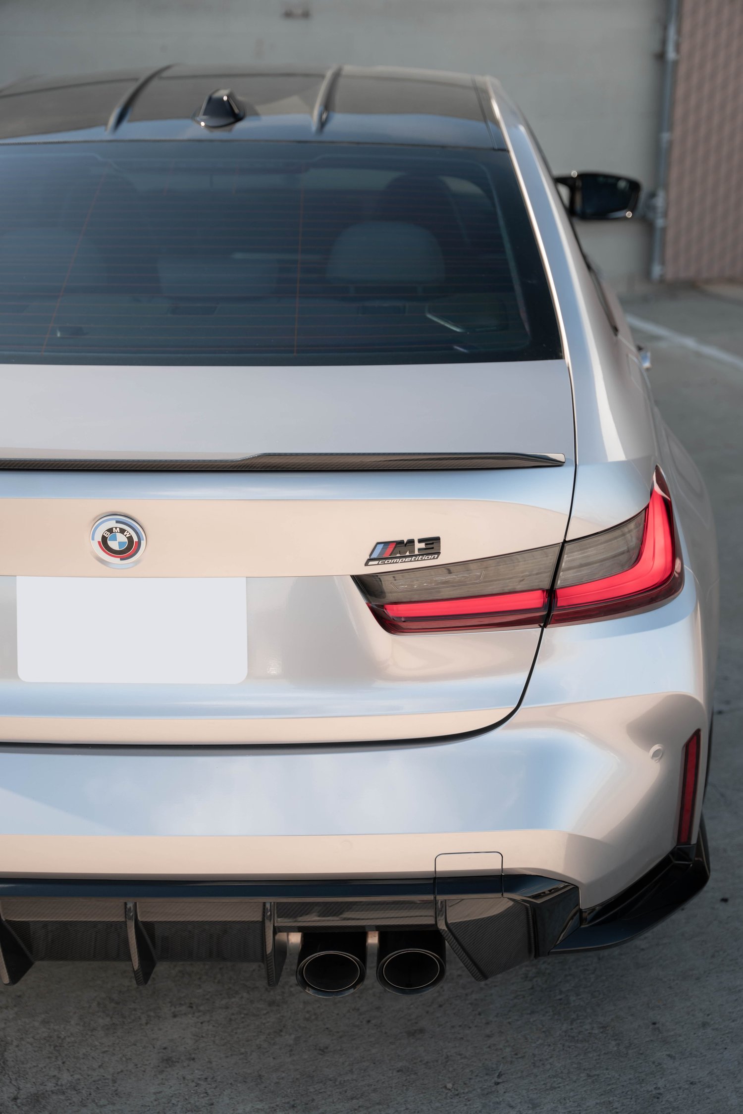 BMW M3 Gloss Silver Vinyl Wrap, side-mirror and front-quarter detail