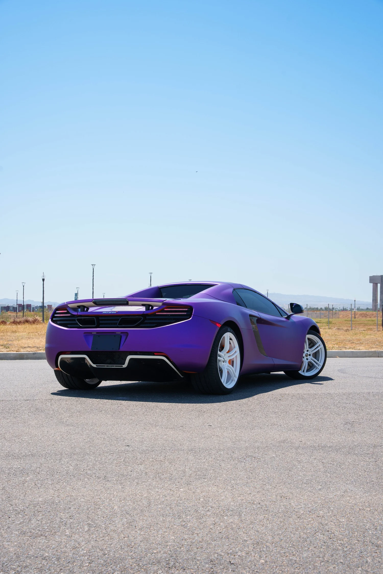 McLaren MP4-12C after Vinyl Wrap, wide outdoor view