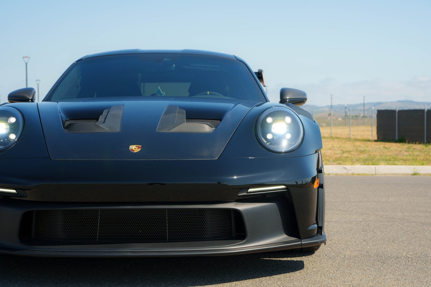 Black Porsche 992.1 GT3 RS front view after paint protection film