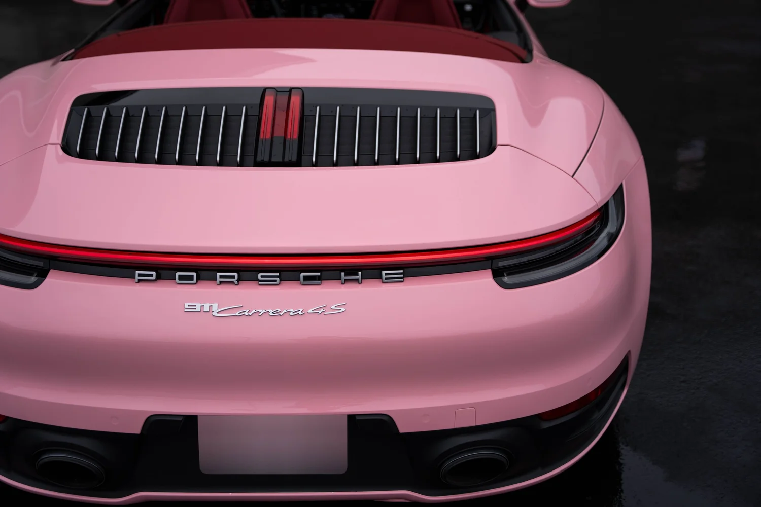 Porsche 911 Sakura Pink after Vinyl Wrap, rear bumper and taillight detail