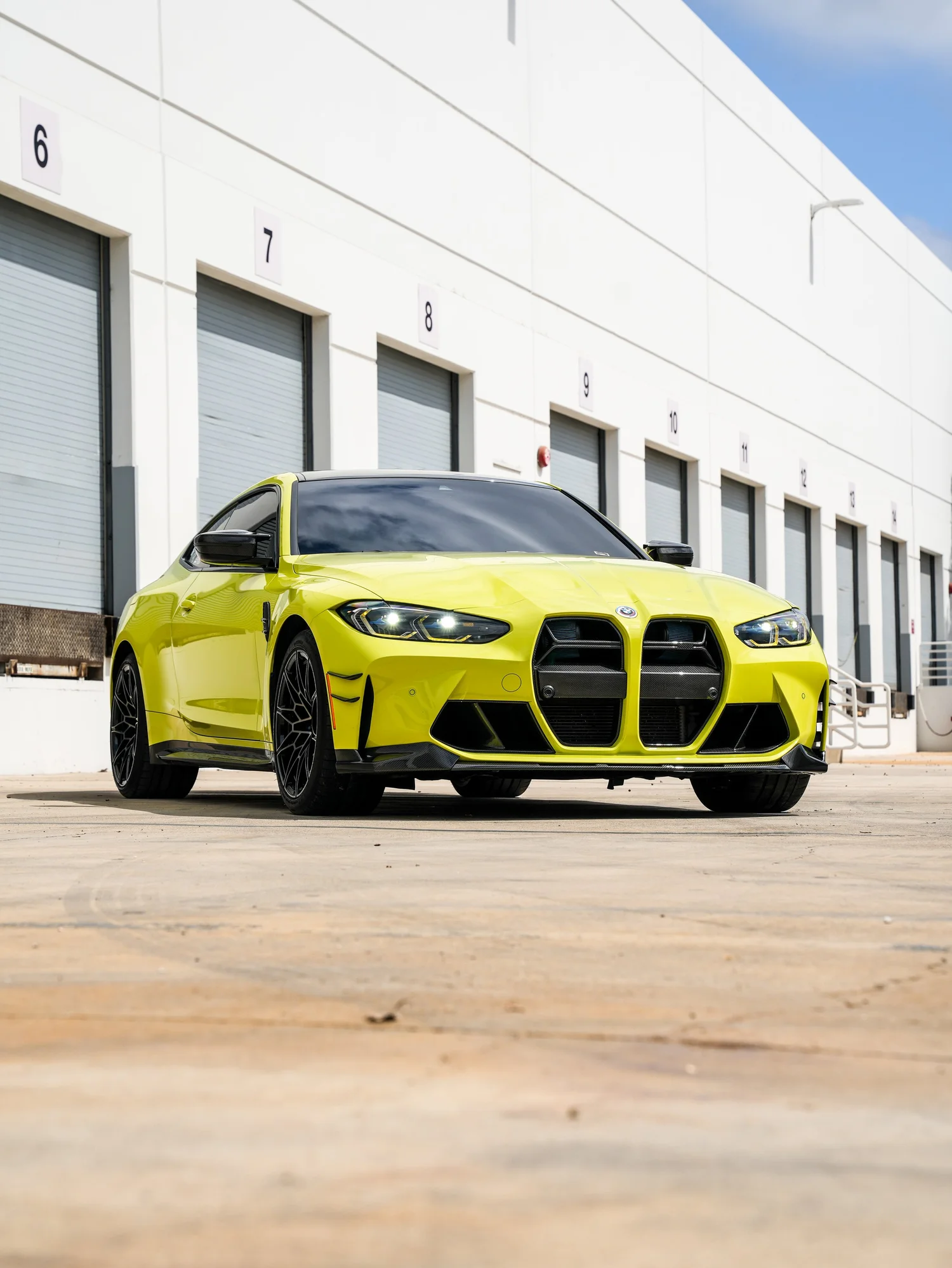 BMW M4 after Paint Protection Film (PPF), low-angle front view