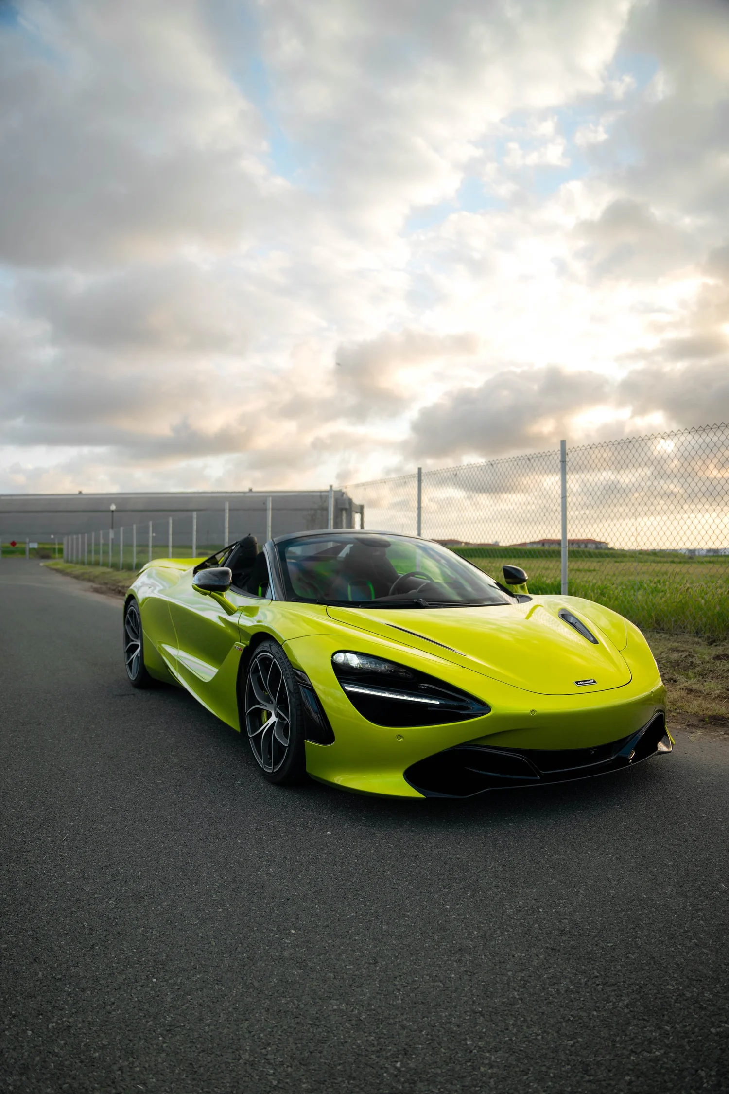 Green McLaren 720S after Paint Protection Film (PPF), Window Tint and Ceramic Coating, wide outdoor view