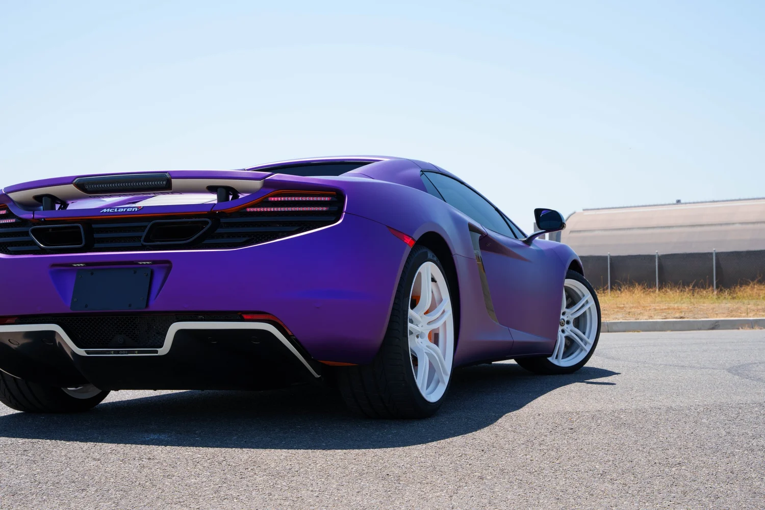 McLaren MP4-12C after Vinyl Wrap, rear-right three-quarter view
