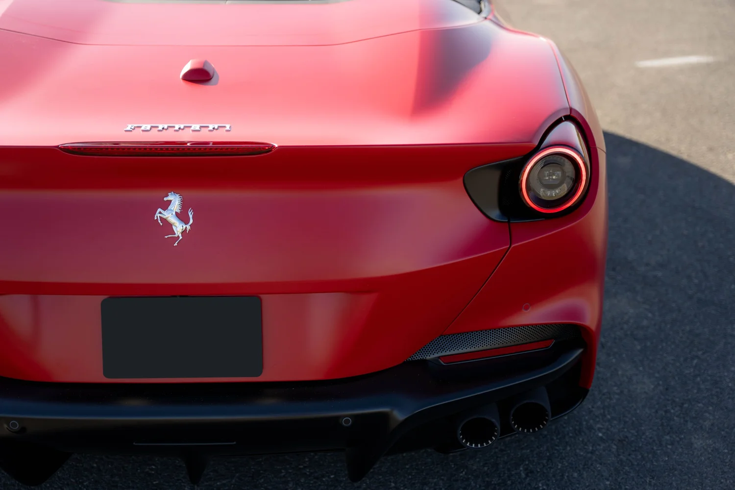 Ferrari Portofino after Matte PPF, Window Tint and Ceramic Coating, rear bumper and taillight detail