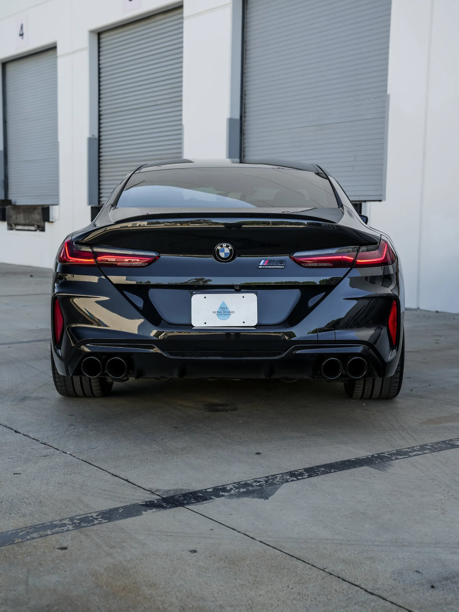 BMW M8 Paint Correction after Ceramic Coating, rear-right three-quarter view
