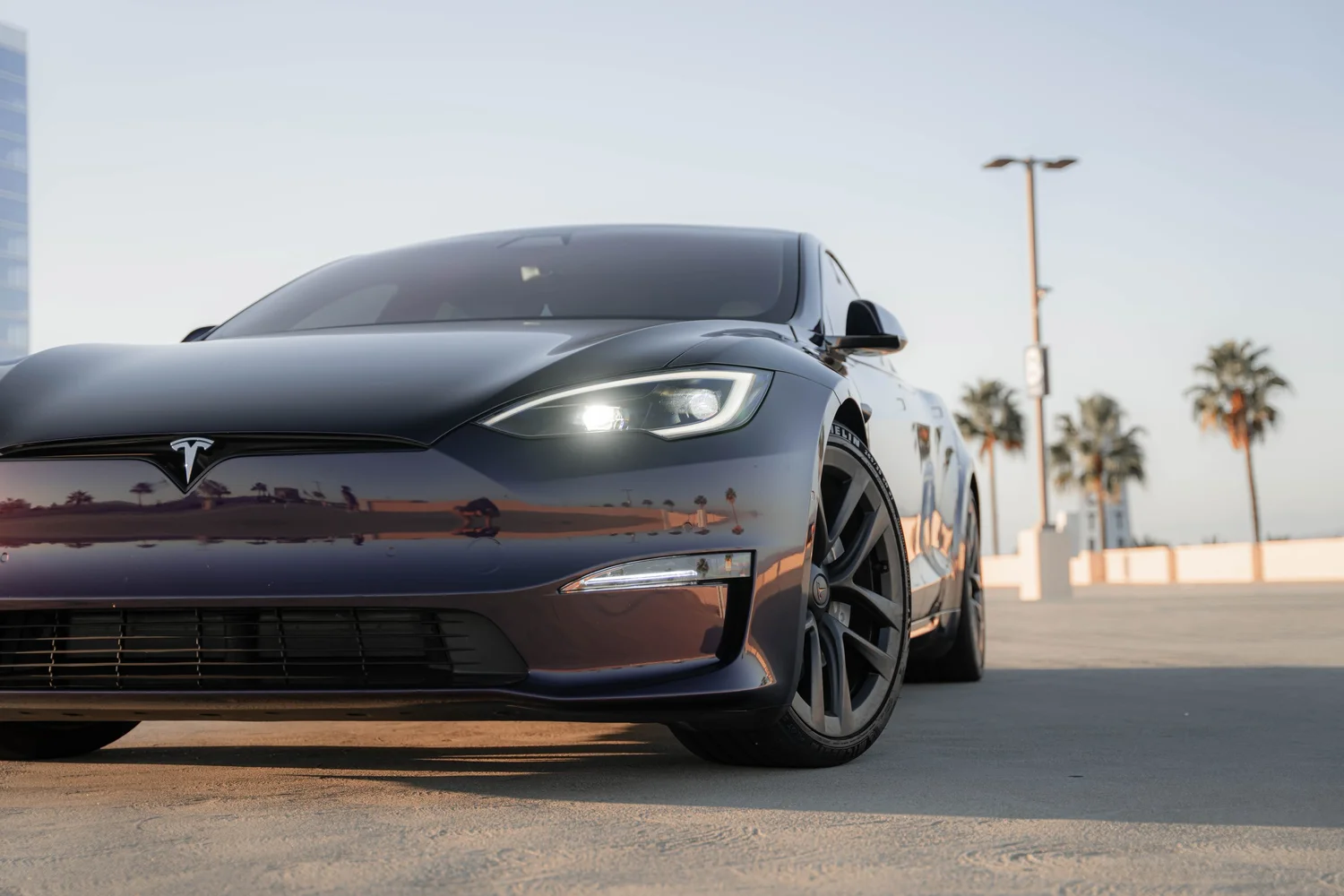 Tesla Model S Midnight Purple after Vinyl Wrap, front wheel and body view