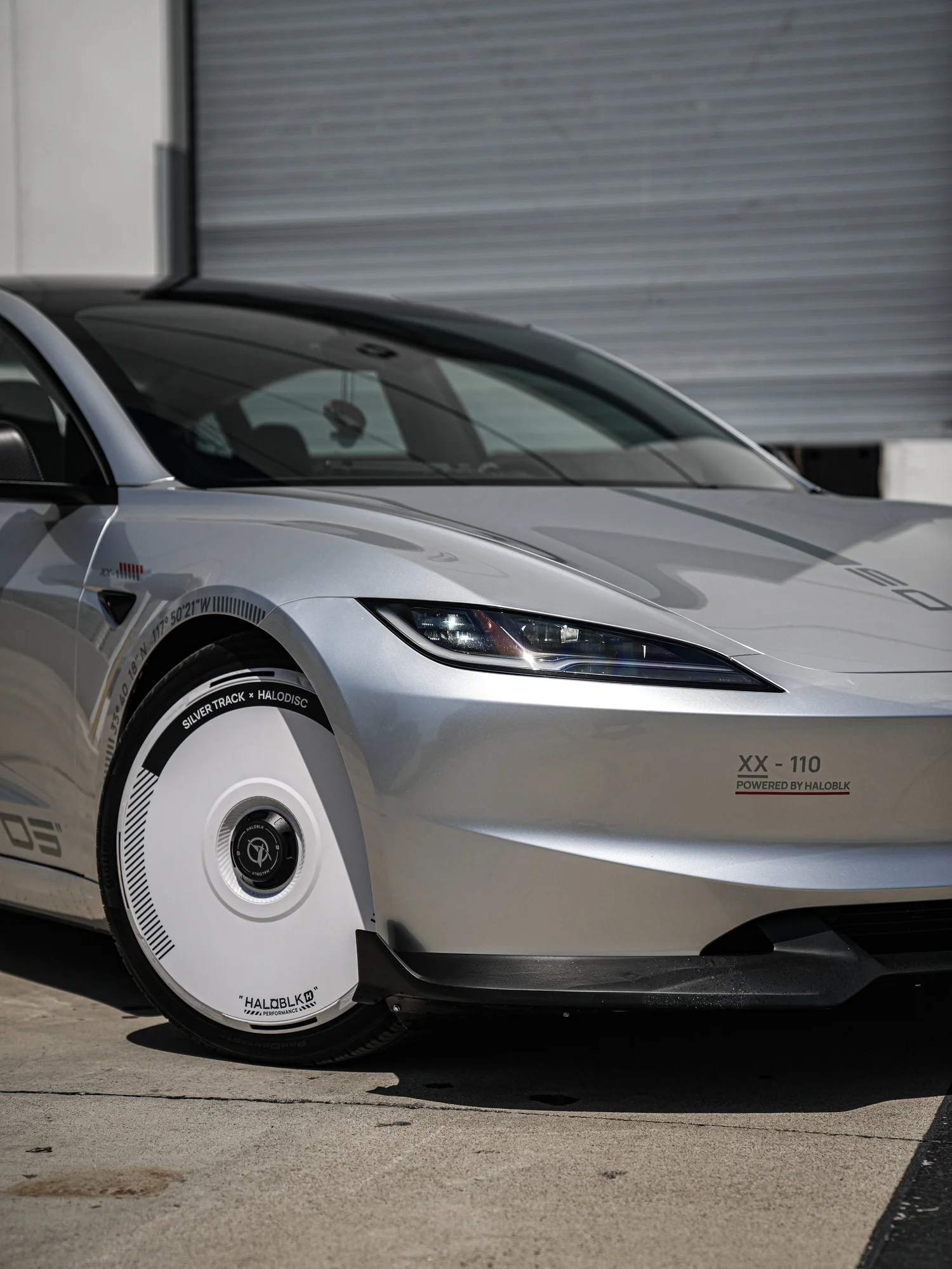 Tesla Model 3 Halo Edition Custom Wrap after Vinyl Wrap, front wheel and body view
