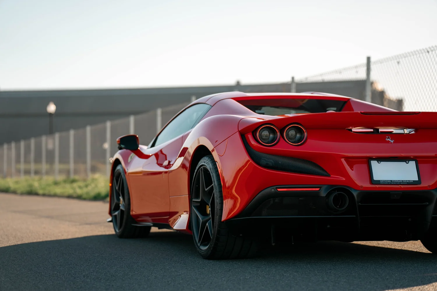 Red Ferrari F8 after Paint Protection Film (PPF), Window Tint and Ceramic Coating, rear-right three-quarter view