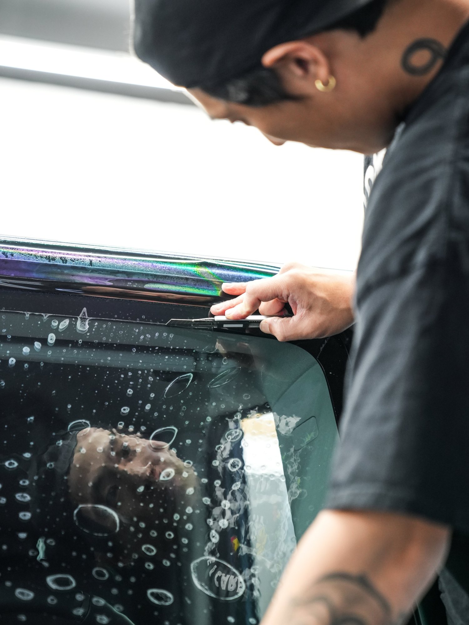 INEOS Grenadier after Window Tint, film-edge and surface-finish detail
