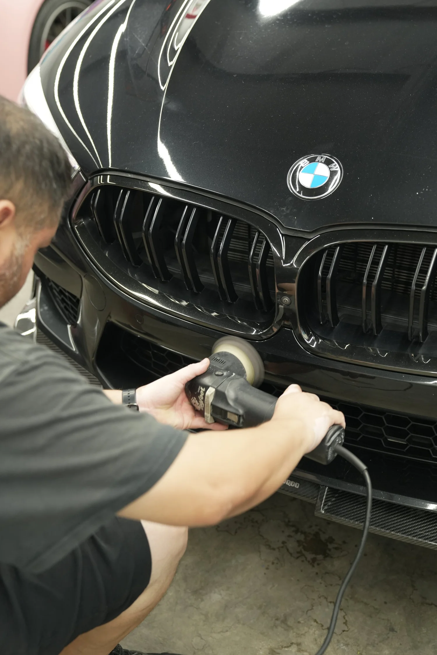 BMW M8 polishing process around the front grille