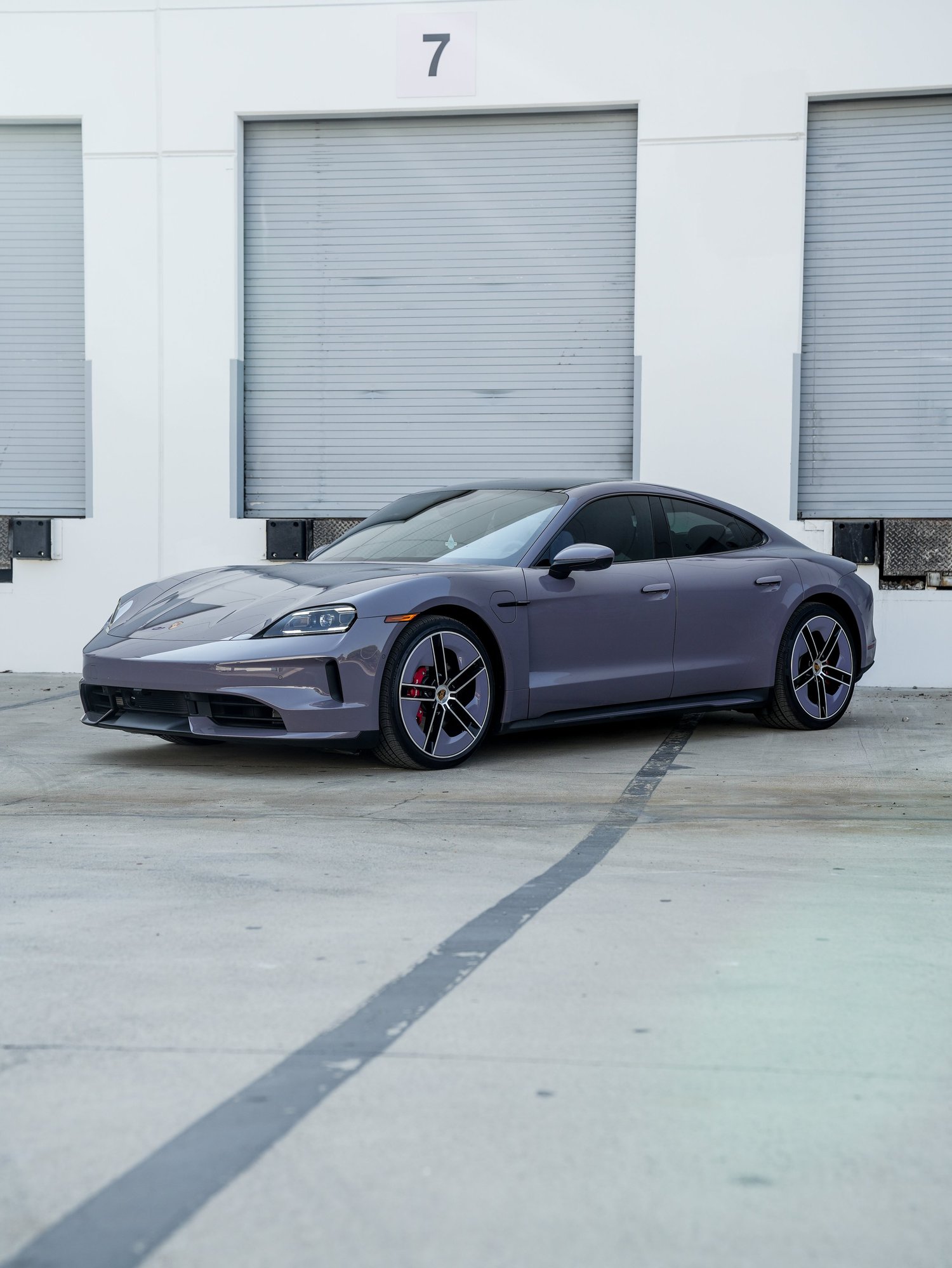 Porsche Taycan opposite front three-quarter view