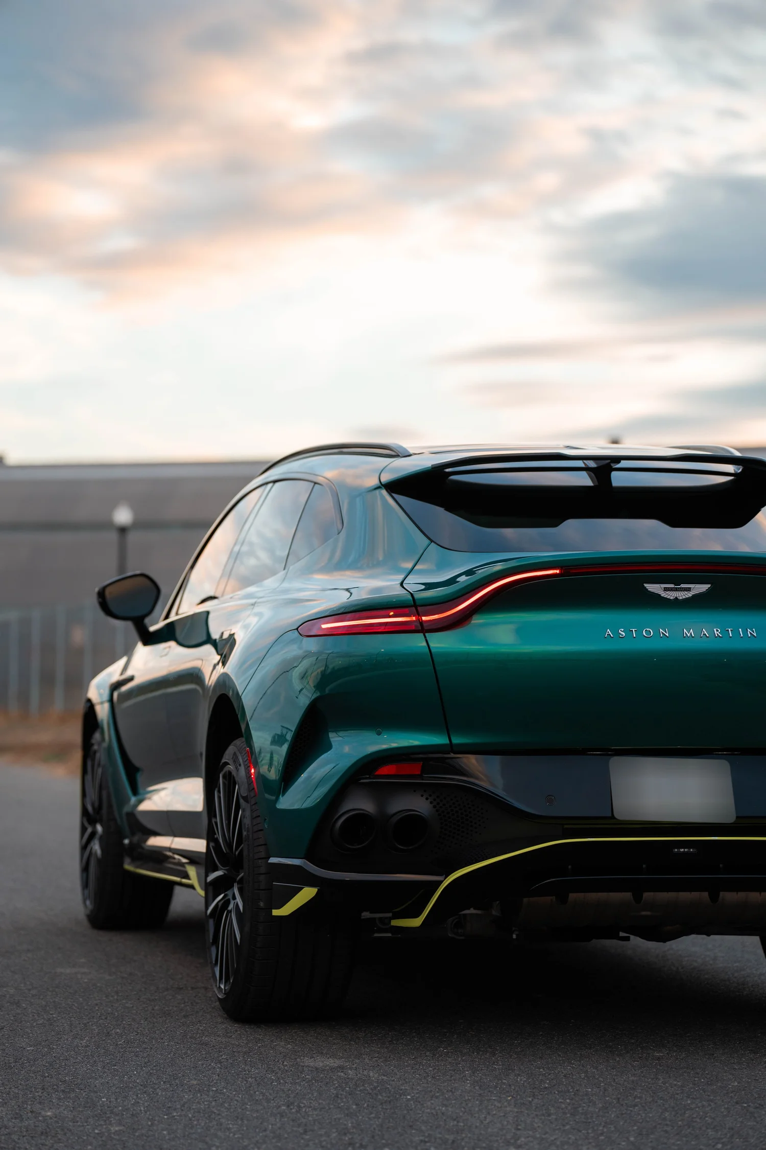 British Green Aston Martin DBX 707 after Paint Protection Film (PPF), Window Tint and Ceramic Coating, low-angle rear view