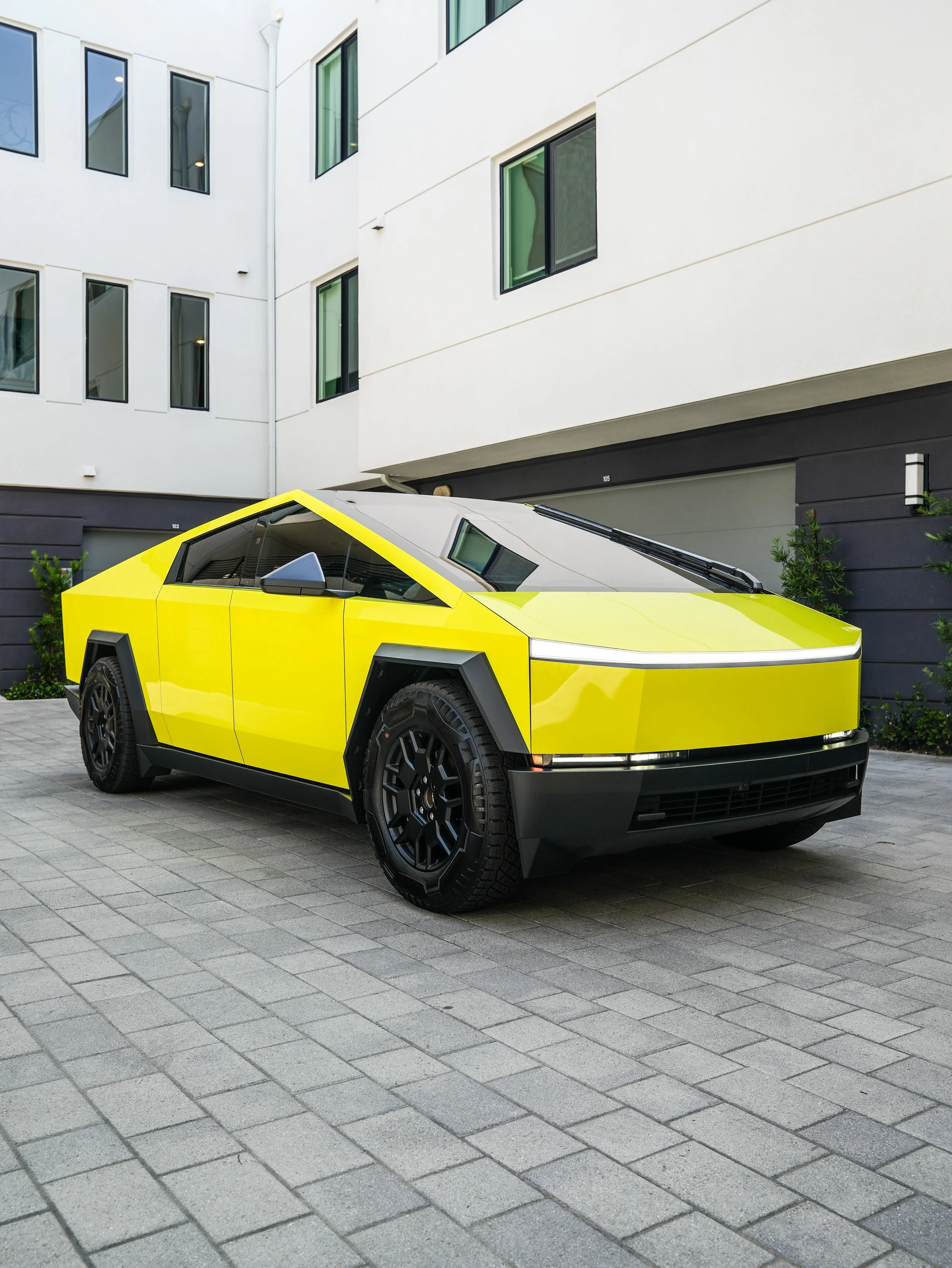 Tesla Cybertruck Inozetek Racing Yellow after window tint and vinyl wrap in Irvine