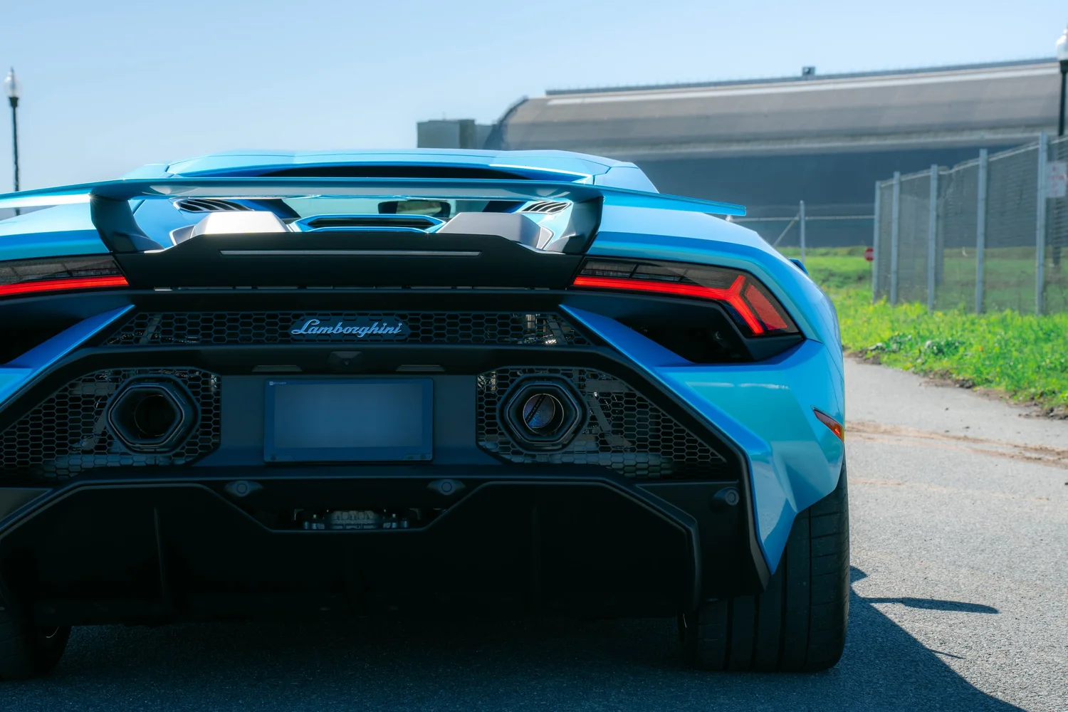 Lamborghini Huracán Tecnica after Paint Protection Film (PPF) and Vinyl Wrap, rear body and taillight view