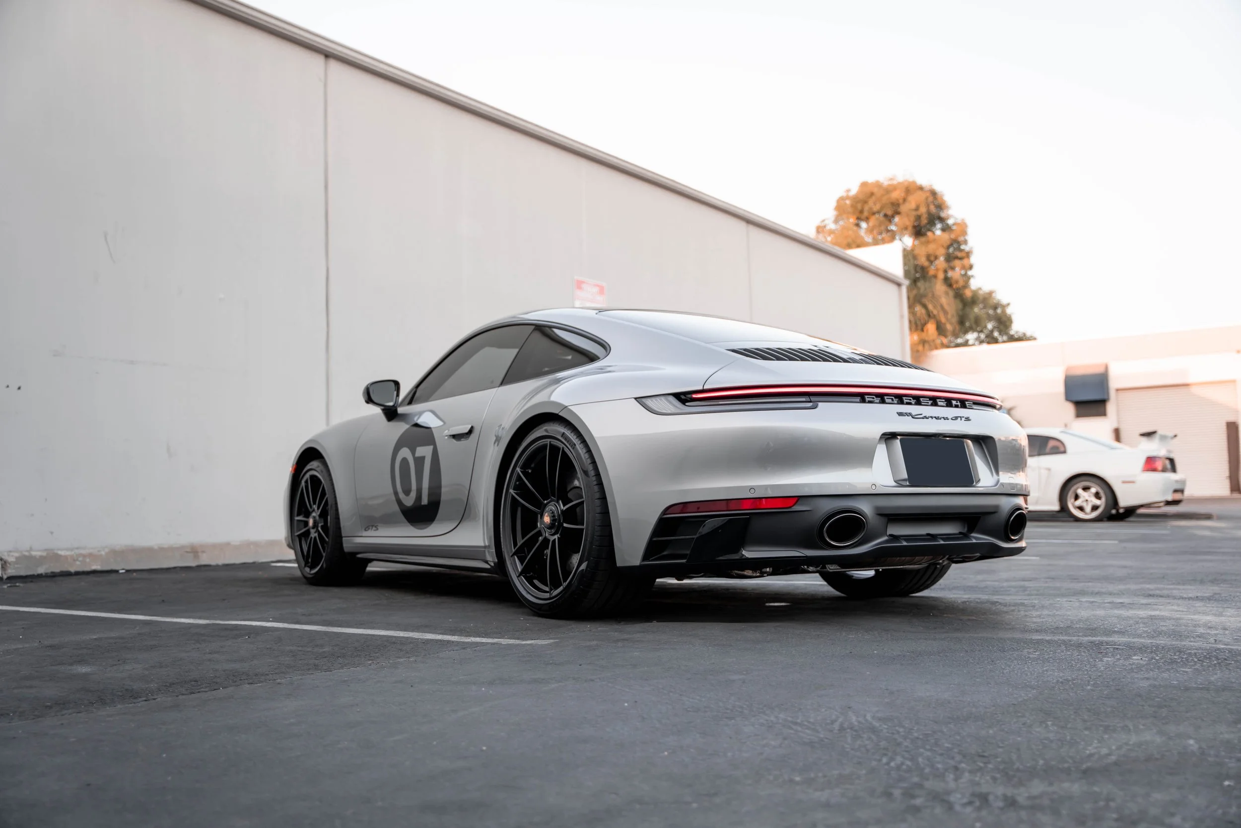 Porsche 911 Carrera GTS (992.1) after paint protection film, window tint, ceramic coating and custom graphics in Irvine