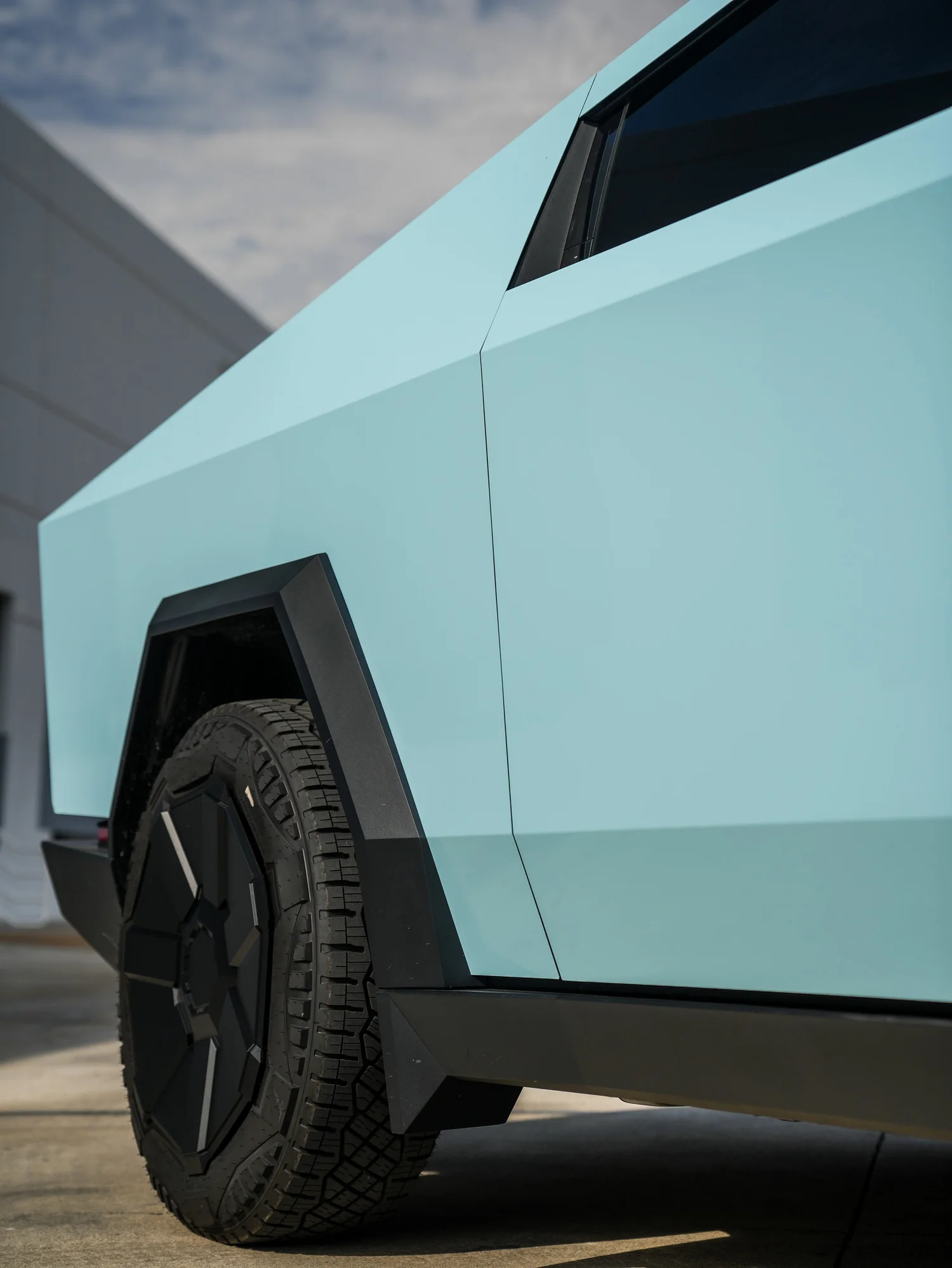 Tesla Cybertruck Permafrost Blue PPF after Paint Protection Film (PPF), rear-quarter and wheel view