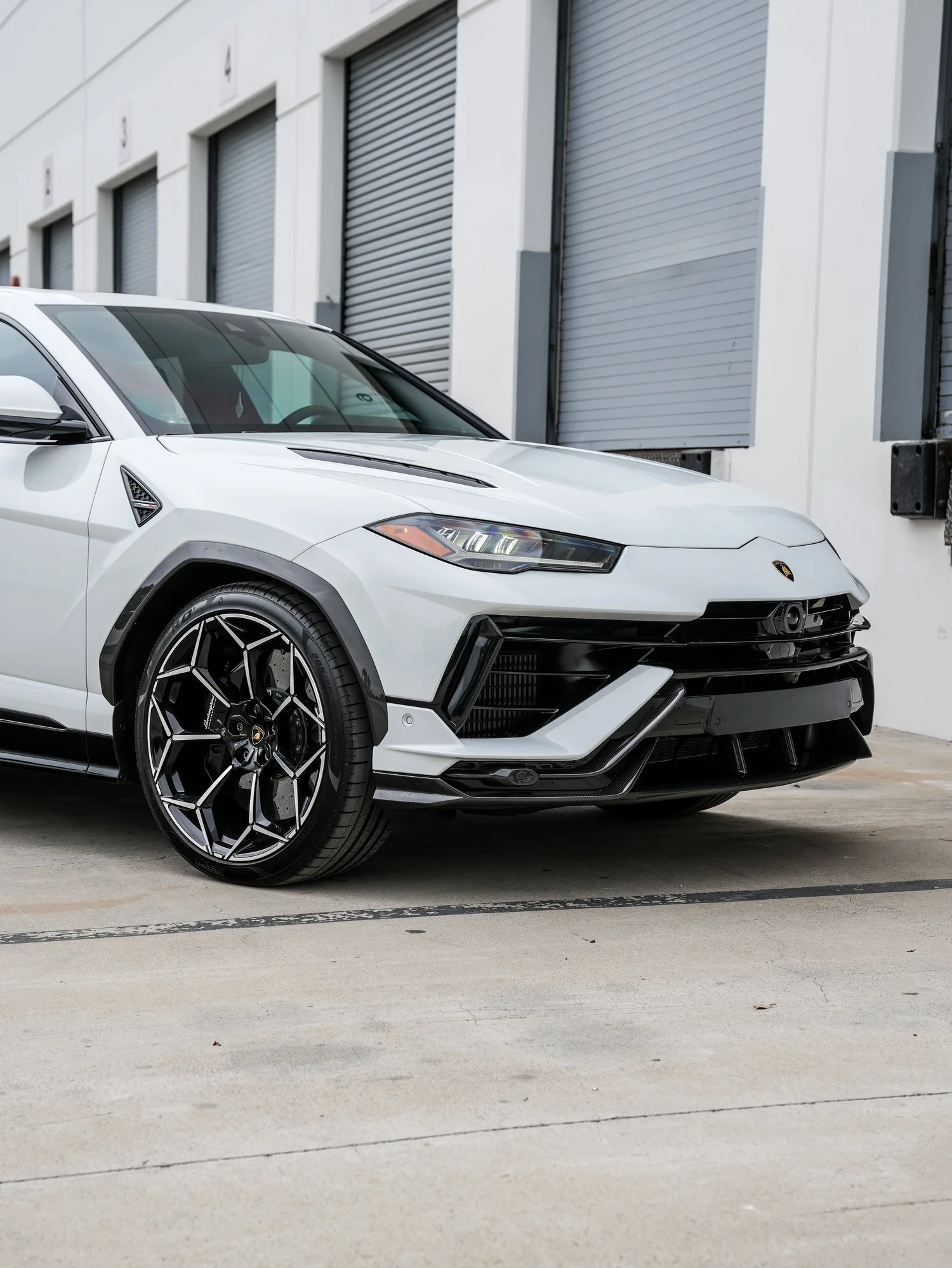 Lamborghini Urus Performante front three-quarter finished view from the driver side after full exterior PPF, window tint and ceramic coating