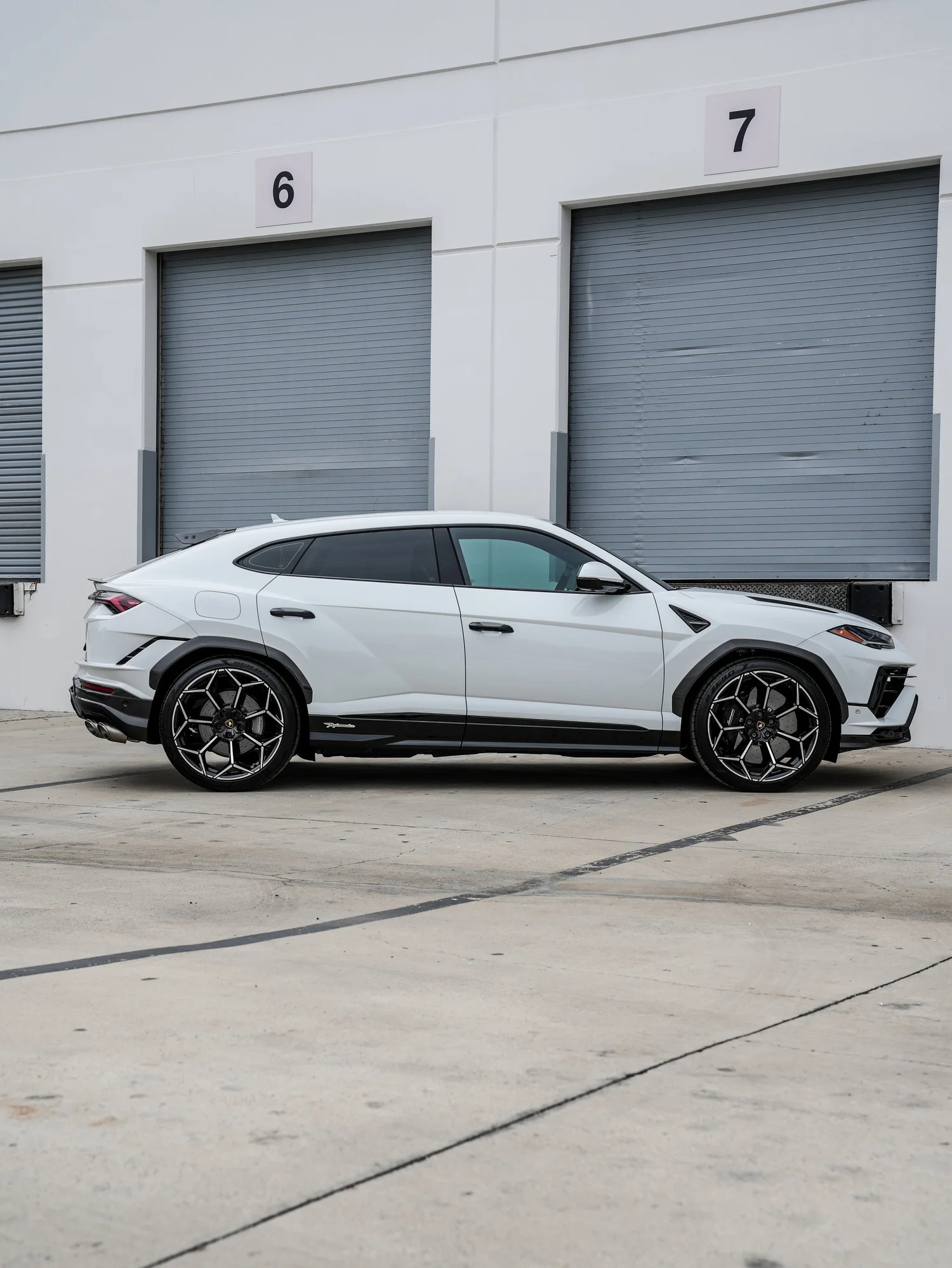 Lamborghini Urus Performante full driver-side profile after full exterior PPF, window tint and ceramic coating
