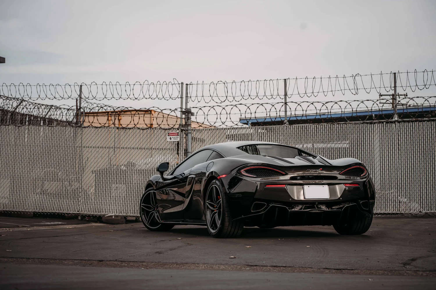 McLaren 570S after Paint Protection Film (PPF), Window Tint and Ceramic Coating, low-angle rear view