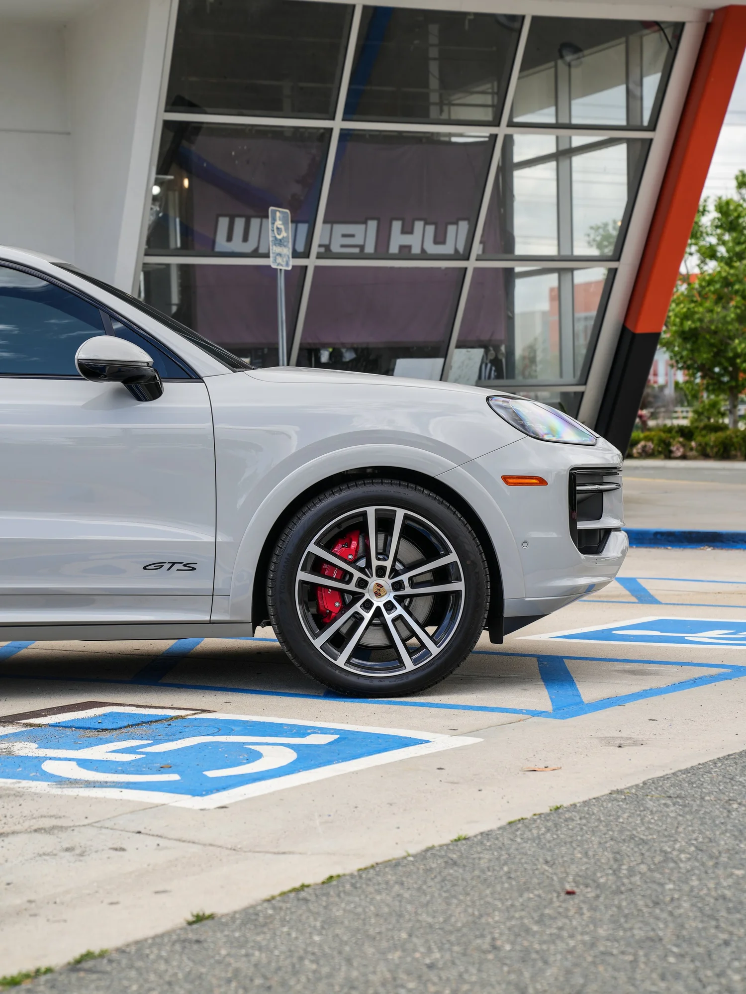 Light Grey Porsche Cayenne GTS after Paint Protection Film (PPF), Window Tint and Ceramic Coating, front wheel and body view