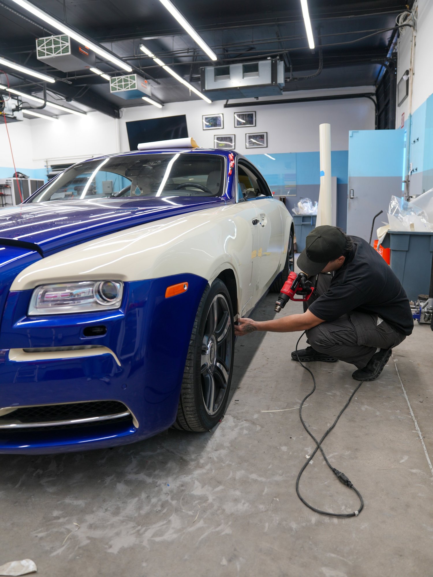 Rolls-Royce Wraith Inozetek Boneyard White after Vinyl Wrap, wide indoor studio view