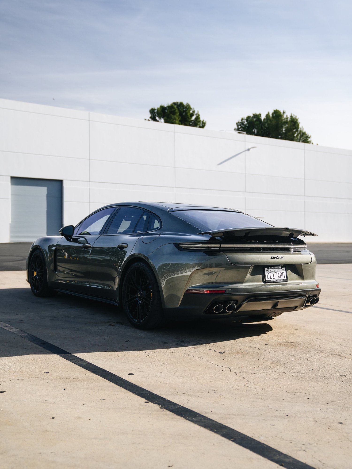 Porsche Panamera Turbo S after Paint Protection Film (PPF), Window Tint and Ceramic Coating, low-angle rear view