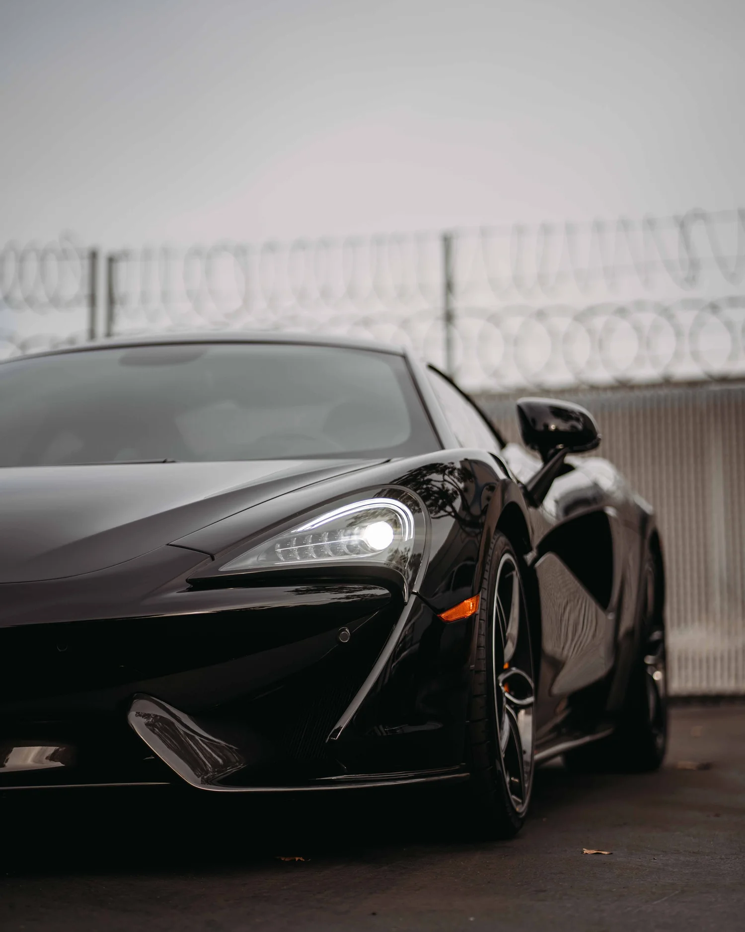 McLaren 570S after Paint Protection Film (PPF), Window Tint and Ceramic Coating, front-corner view