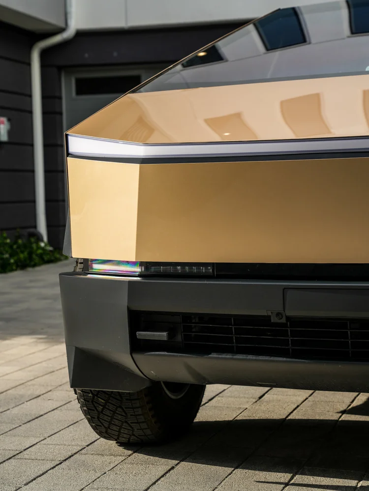 Cybertruck gold front panel and lower lamp above the black bumper