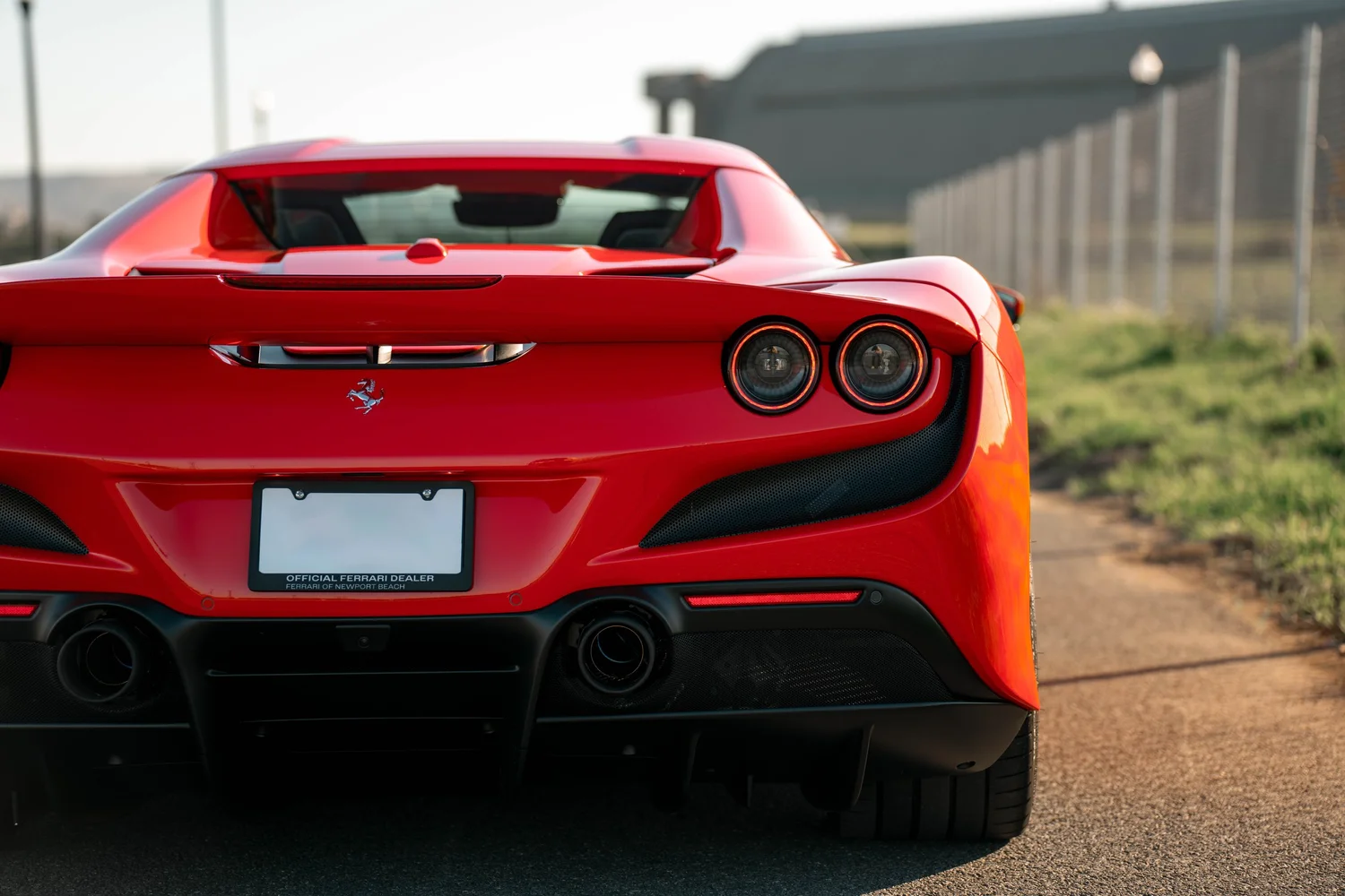 Red Ferrari F8 after Paint Protection Film (PPF), Window Tint and Ceramic Coating, rear bumper and taillight detail