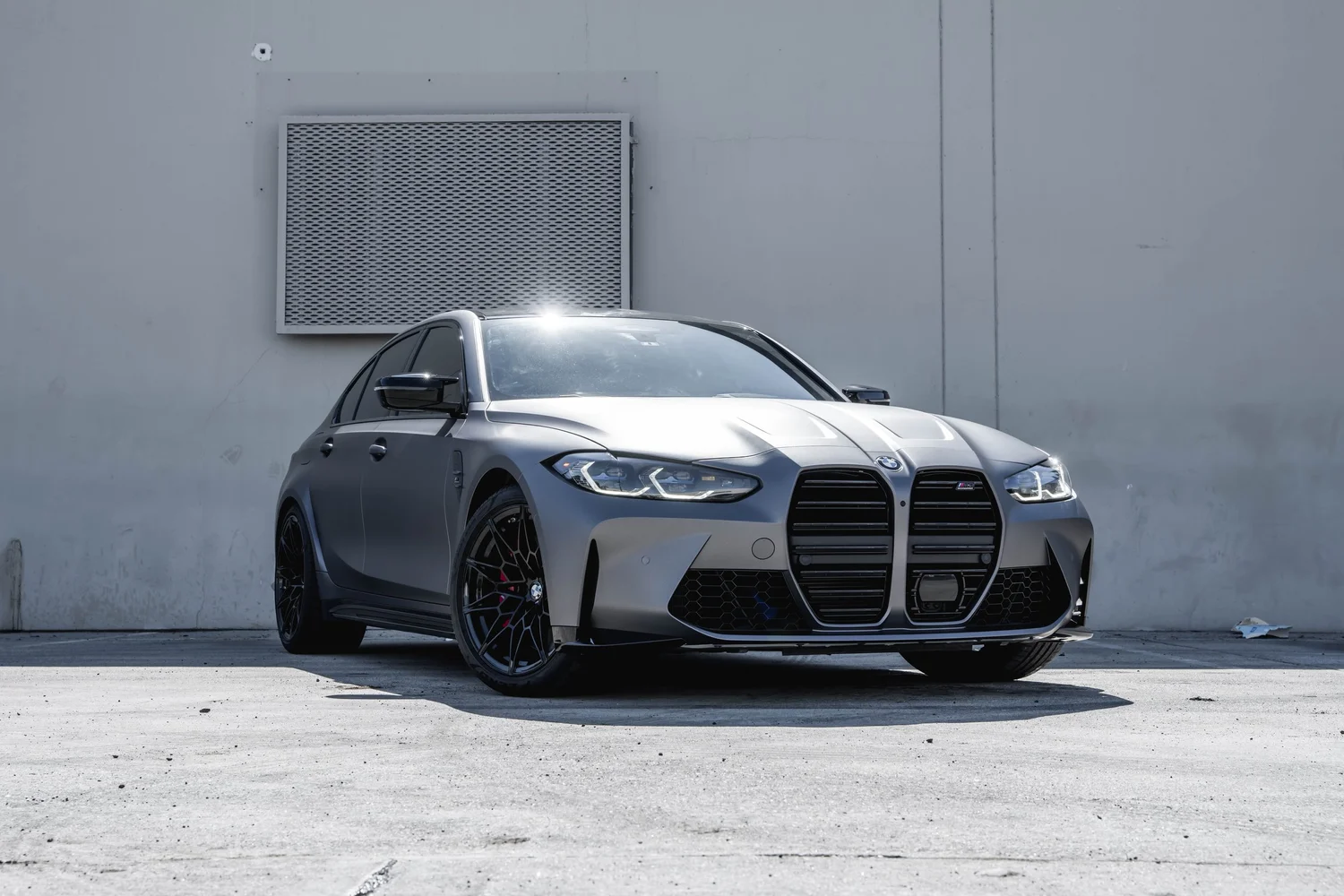 BMW M3 silver vinyl wrap, wide direct front view