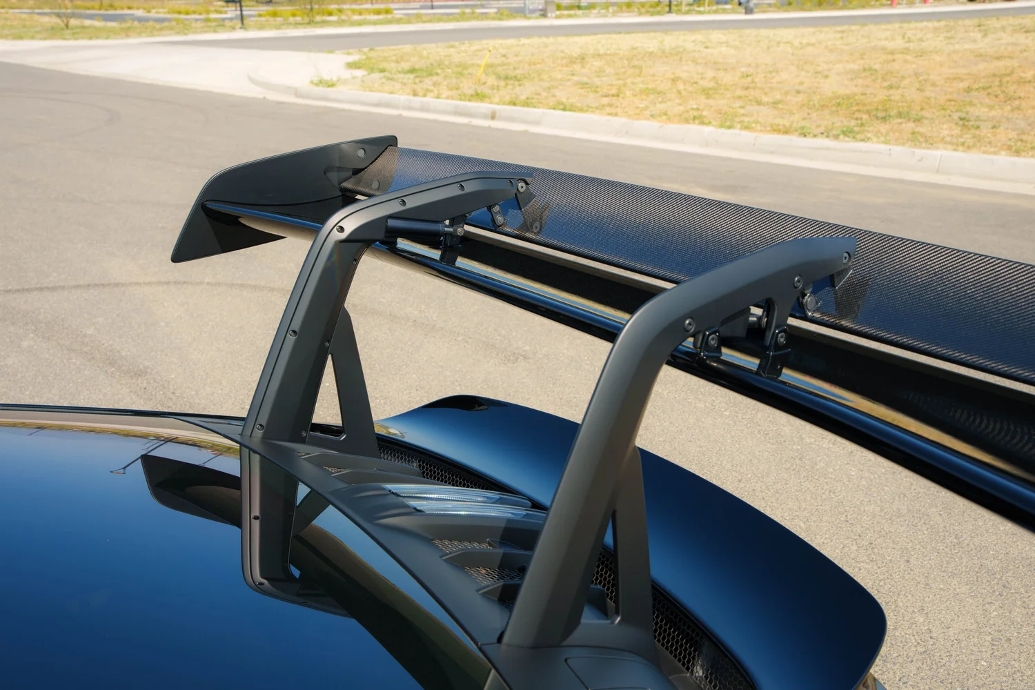 Black Porsche GT3 RS rear wing protected with paint protection film