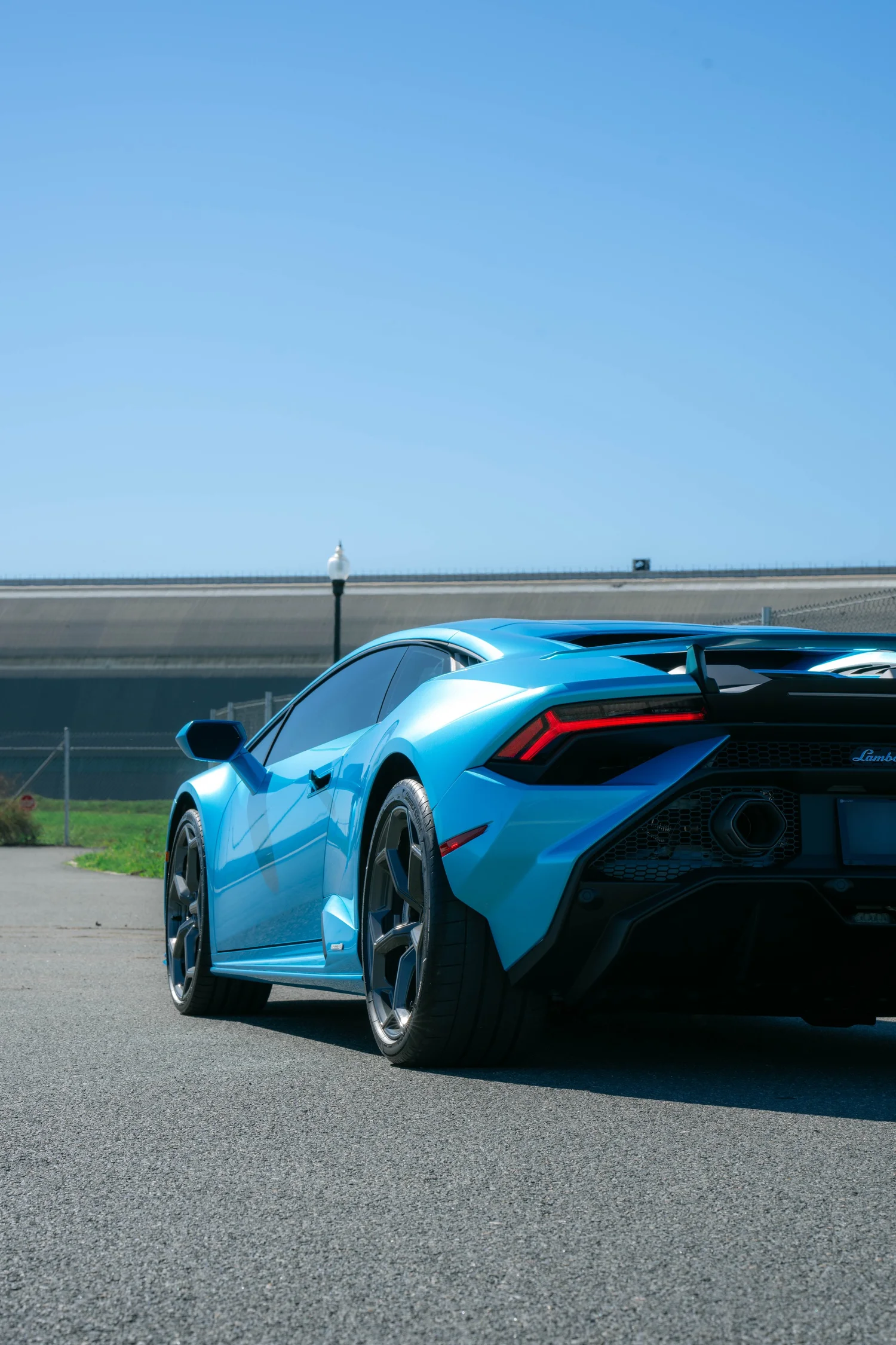 Lamborghini Huracán Tecnica after Paint Protection Film (PPF) and Vinyl Wrap, rear-right three-quarter view