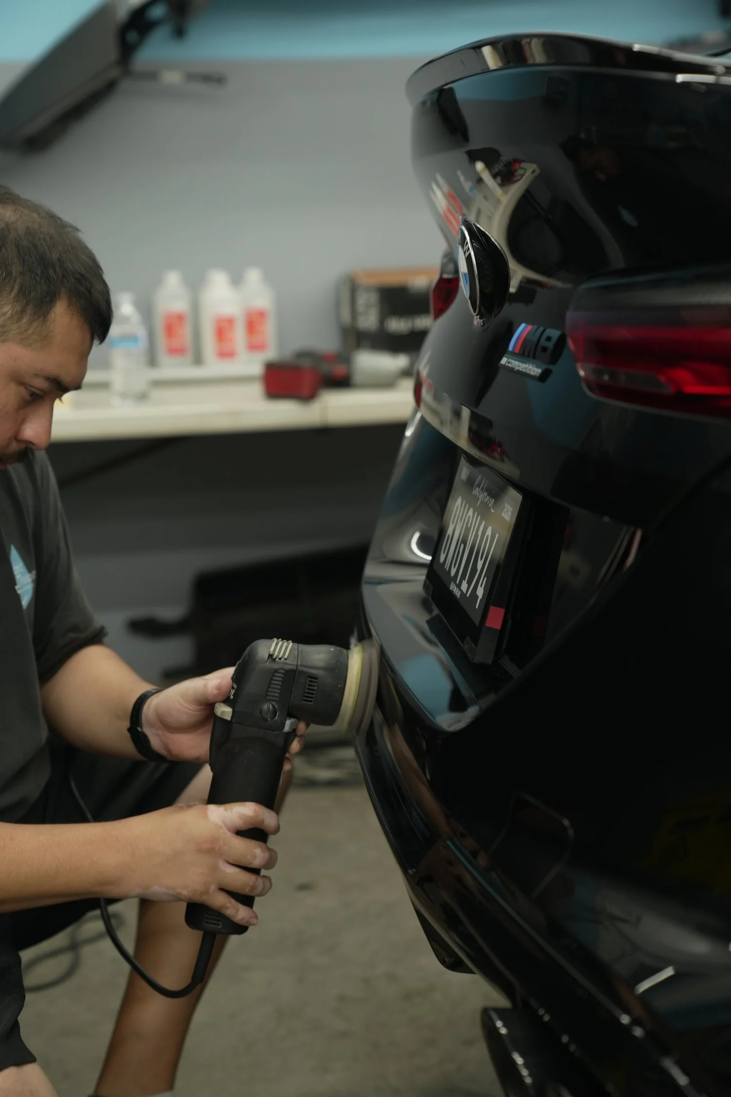 BMW M8 rear paint-polishing process