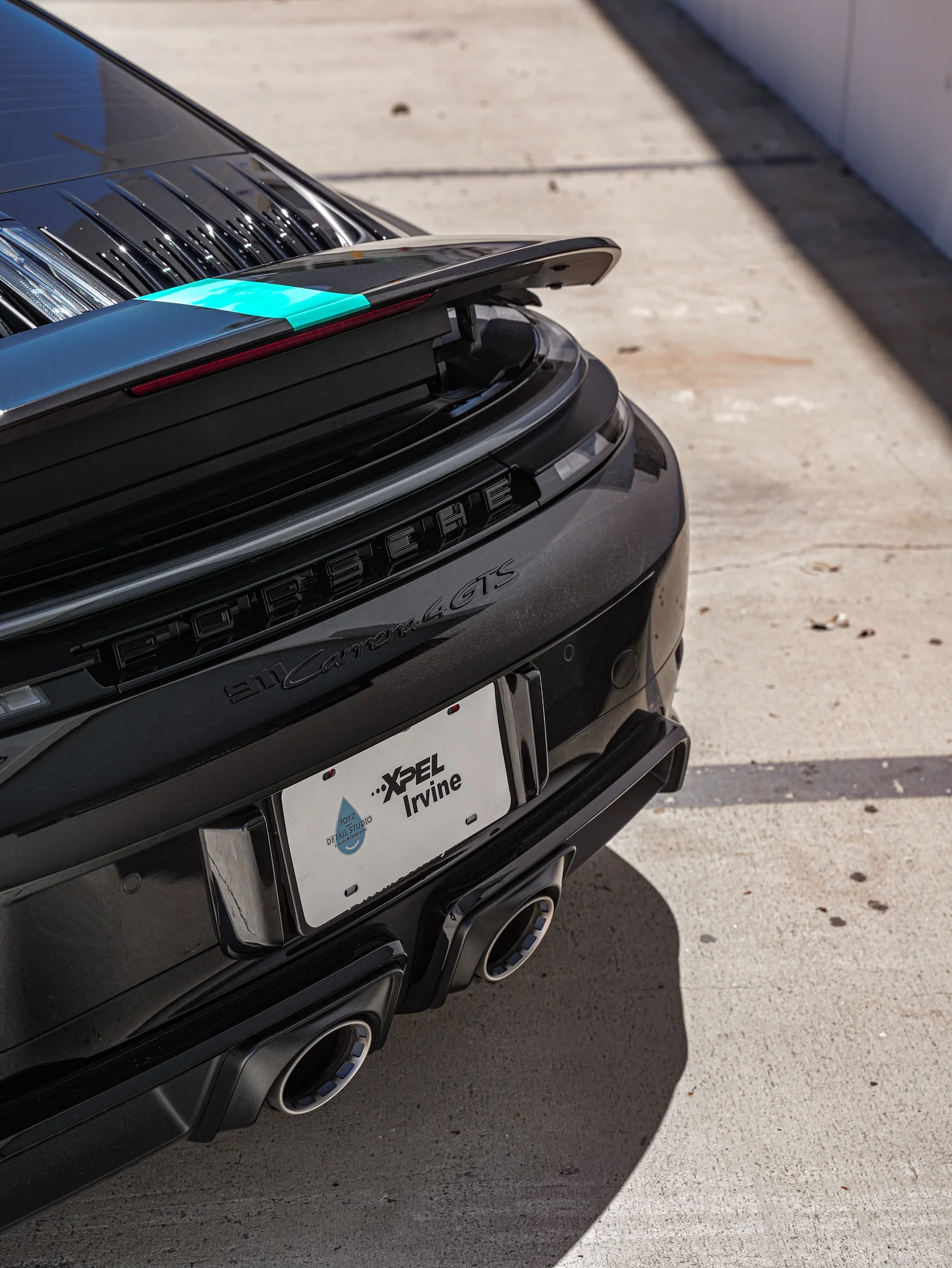 Porsche 911 Carrera 4 GTS (992.2) Custom Decals after Custom Graphics, rear diffuser and exhaust detail