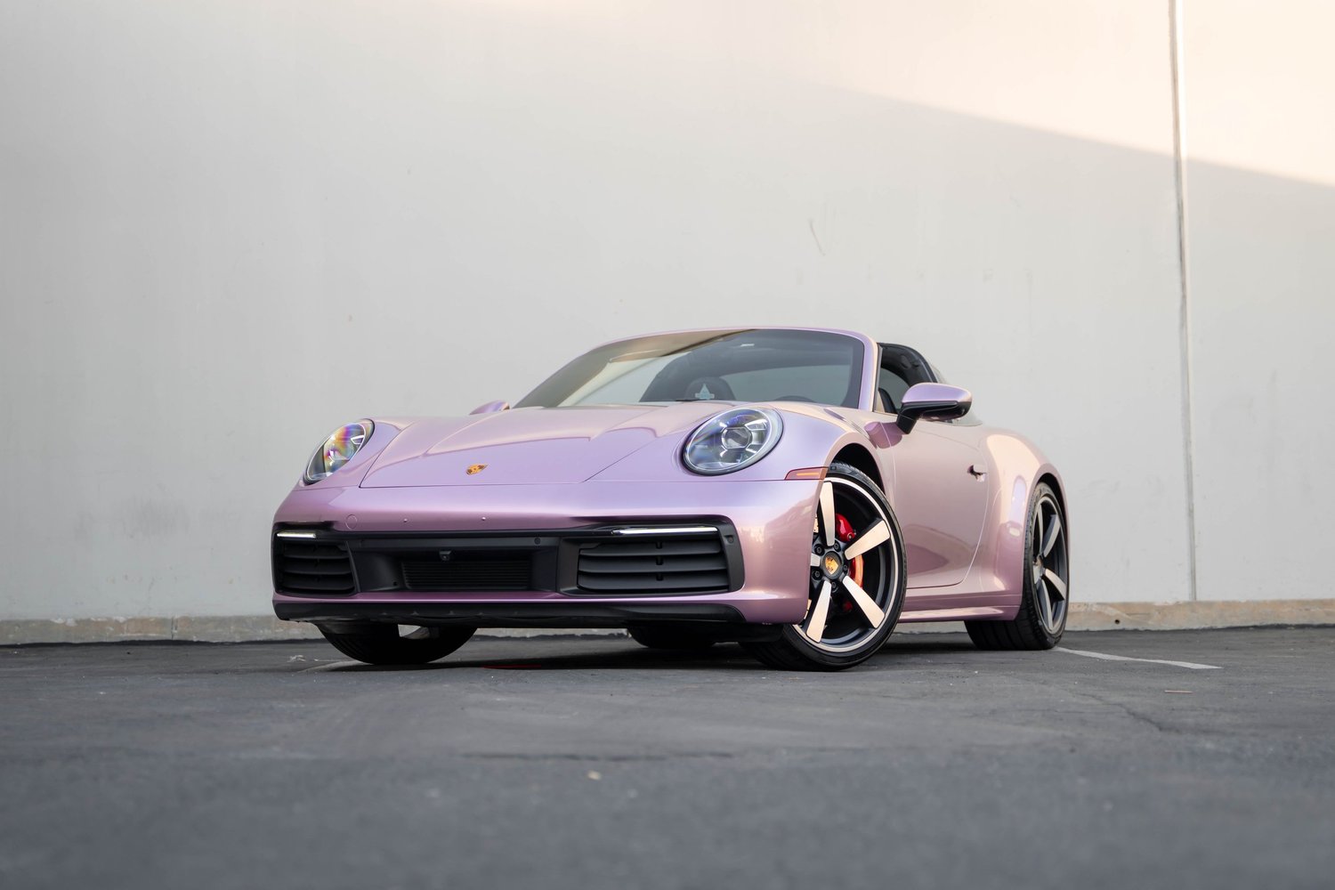 Porsche 911 Metallic Pink after Vinyl Wrap, front-right three-quarter view