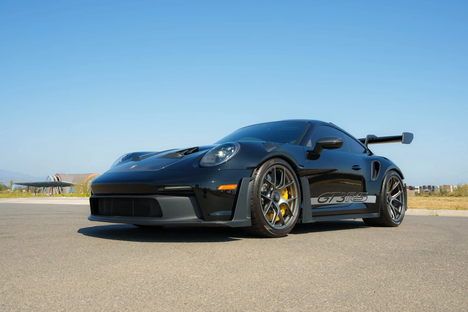 Black Porsche 992.1 GT3 RS front three-quarter view after XPEL PPF